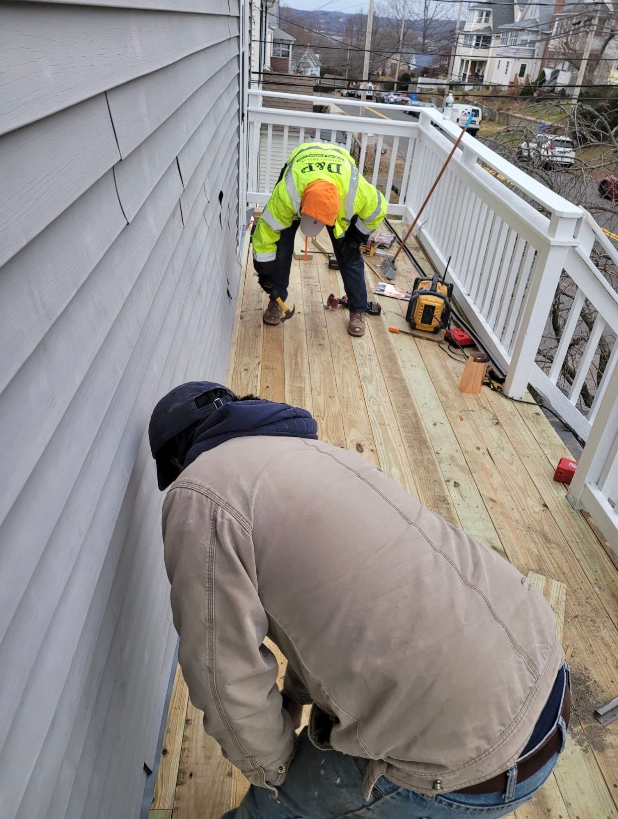 Deck Installation using Pressure treated railing by A Plus Exterior