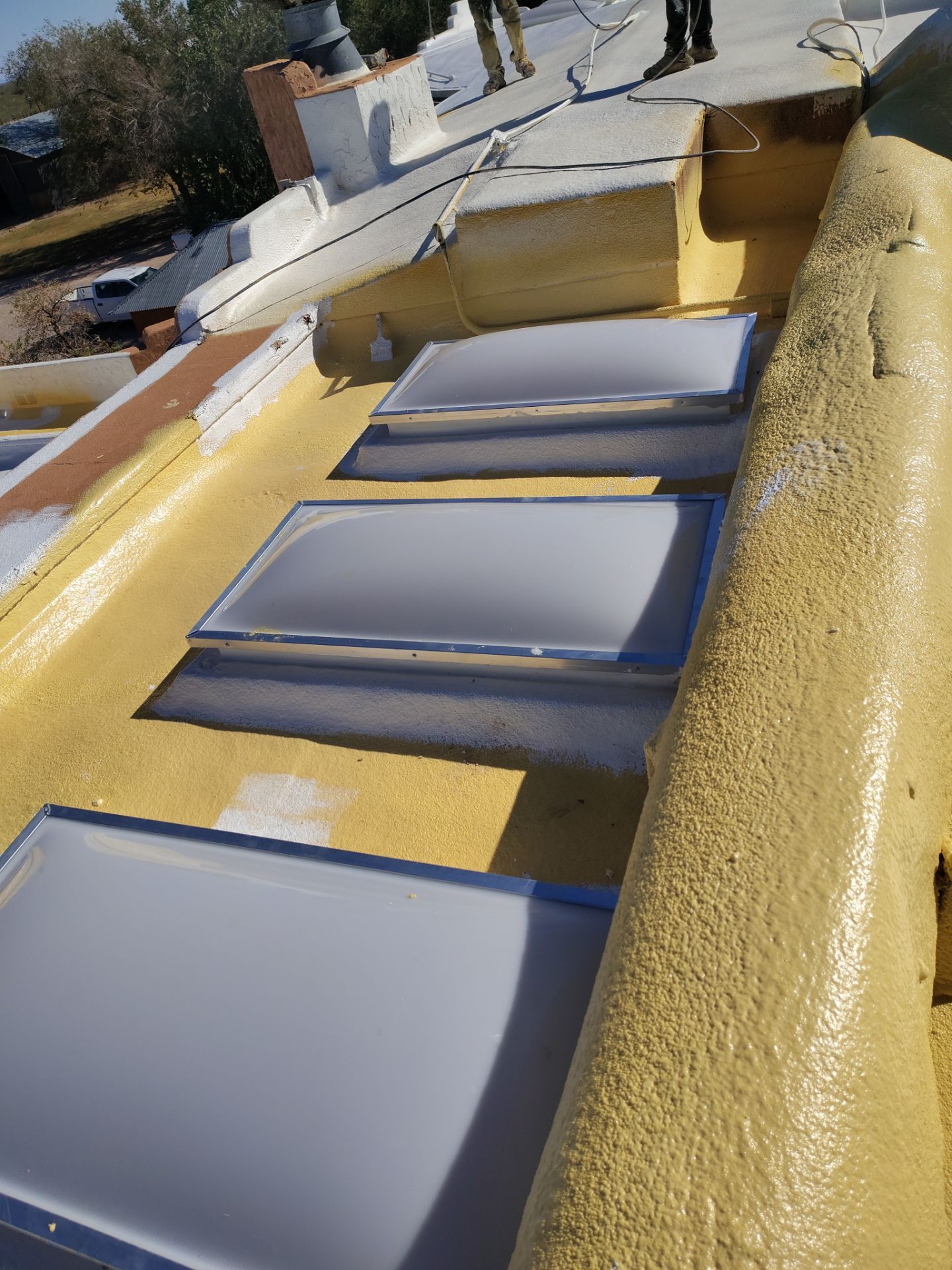 Residential roof application by SPF Services 