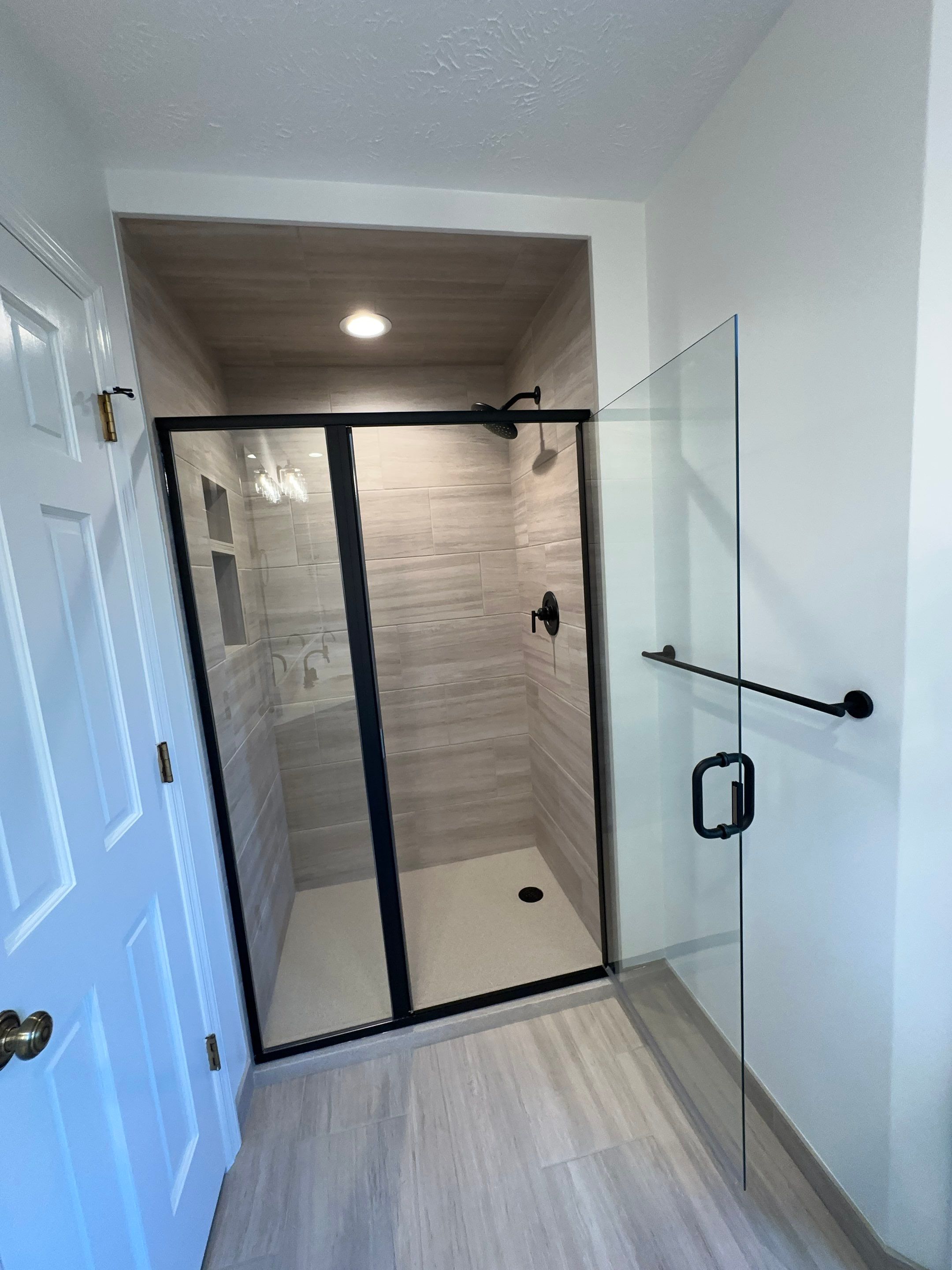 West Omaha Spa-Style Primary Bath Refresh by Bennett Design + Build