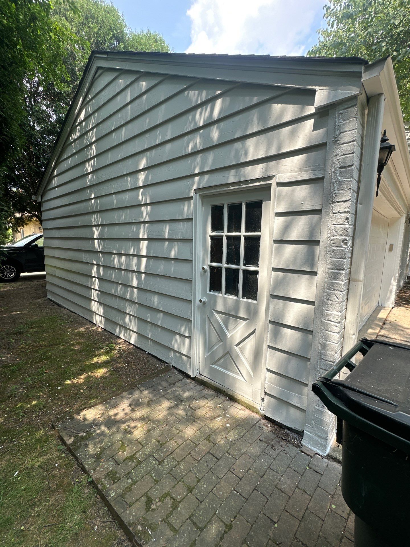 Shorewood Exterior Painting and Siding Refresh With Contrast Trim by OCS Contracting Services