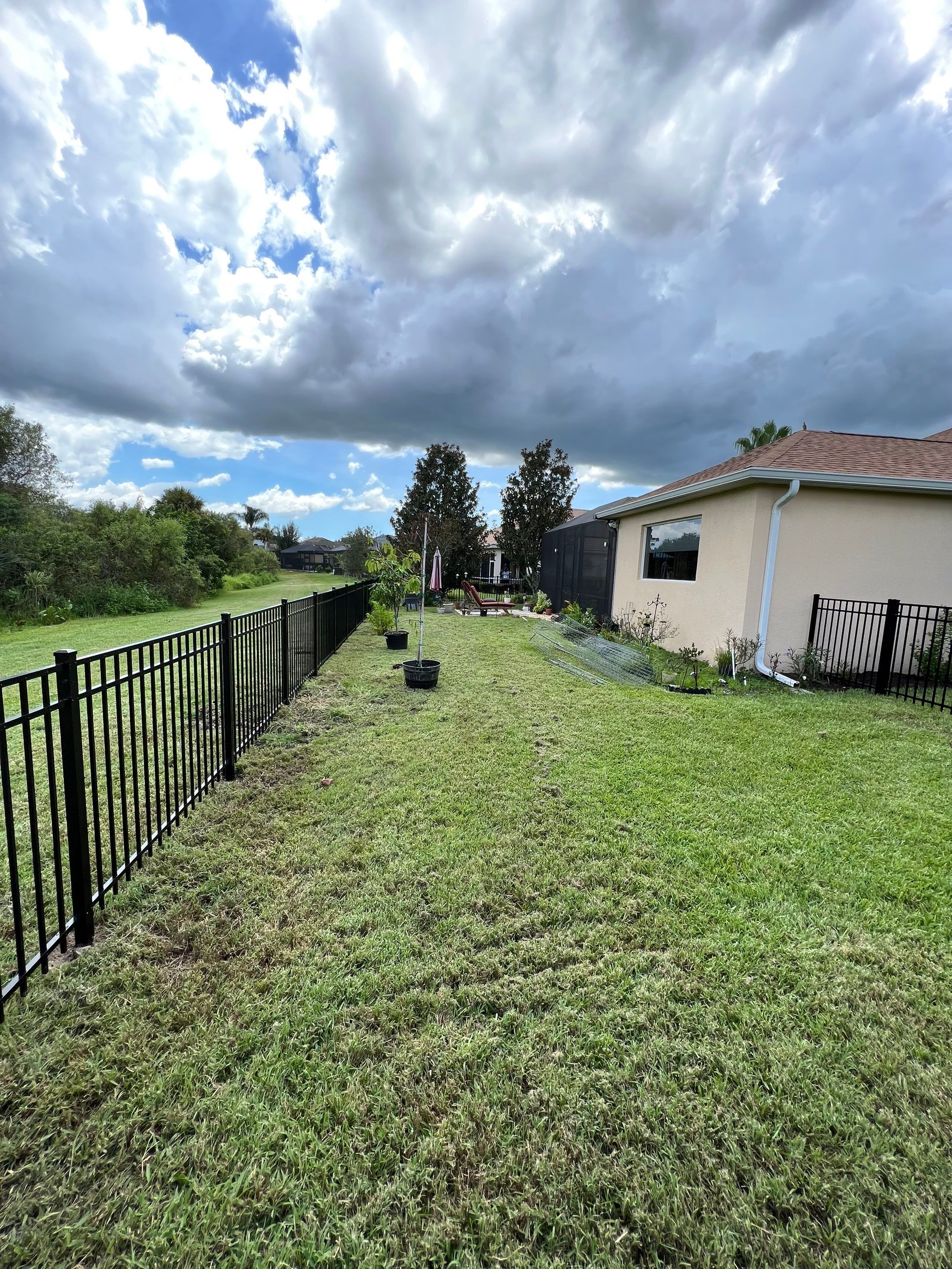Black Aluminum Fence Installation in Bradenton, FL by Asap fence and gates, LLC