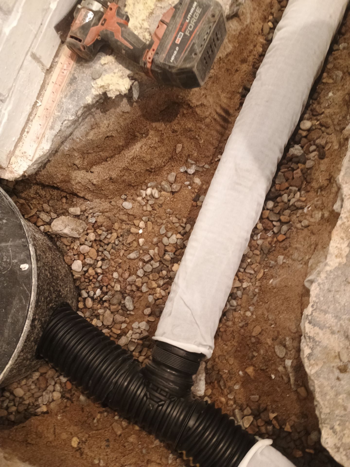 Interior Drain Tile & Sump Pump in Northwest Minneapolis by Waterproofing Northeast