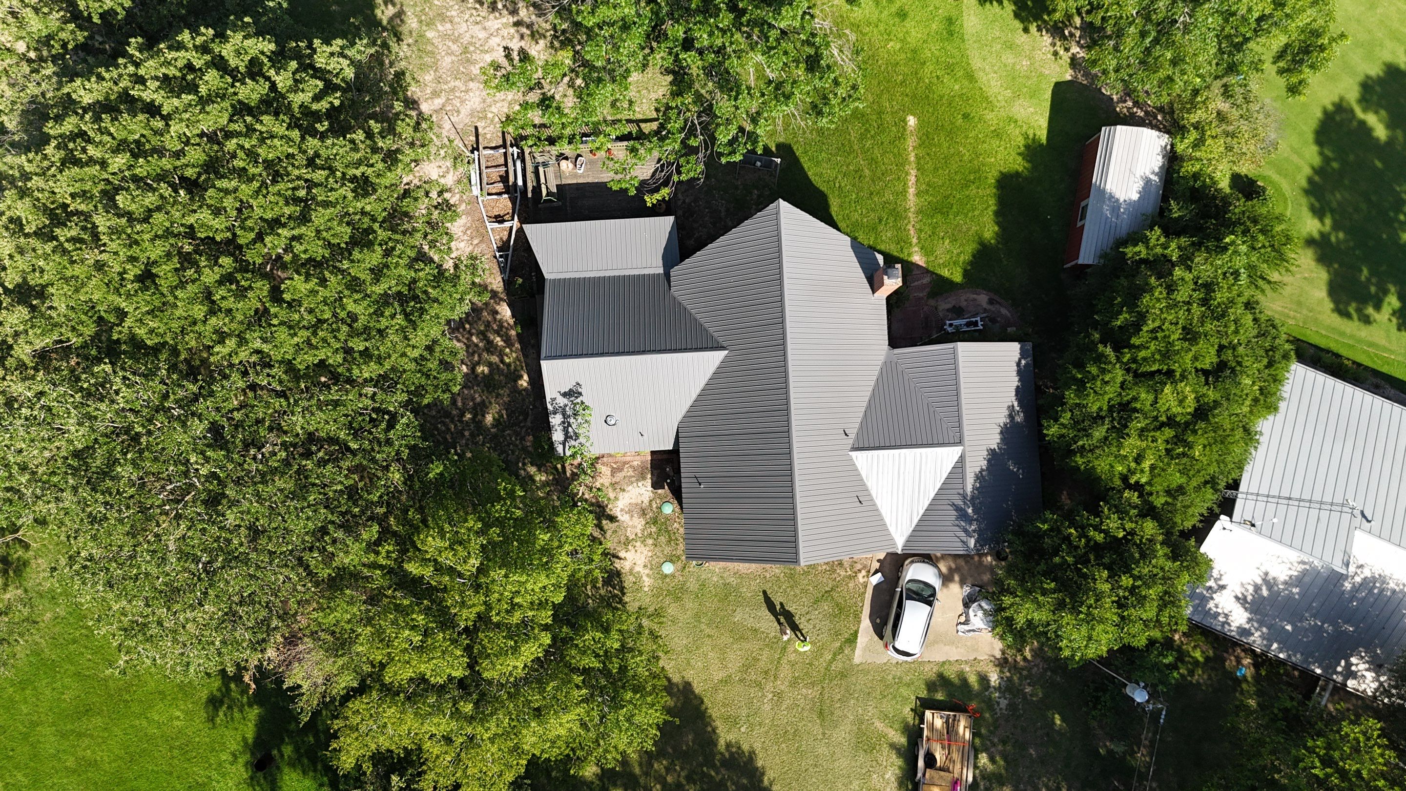 Charcoal Metal Roof at Lake Limestone, Tx by DT Roofing - Seth Wells