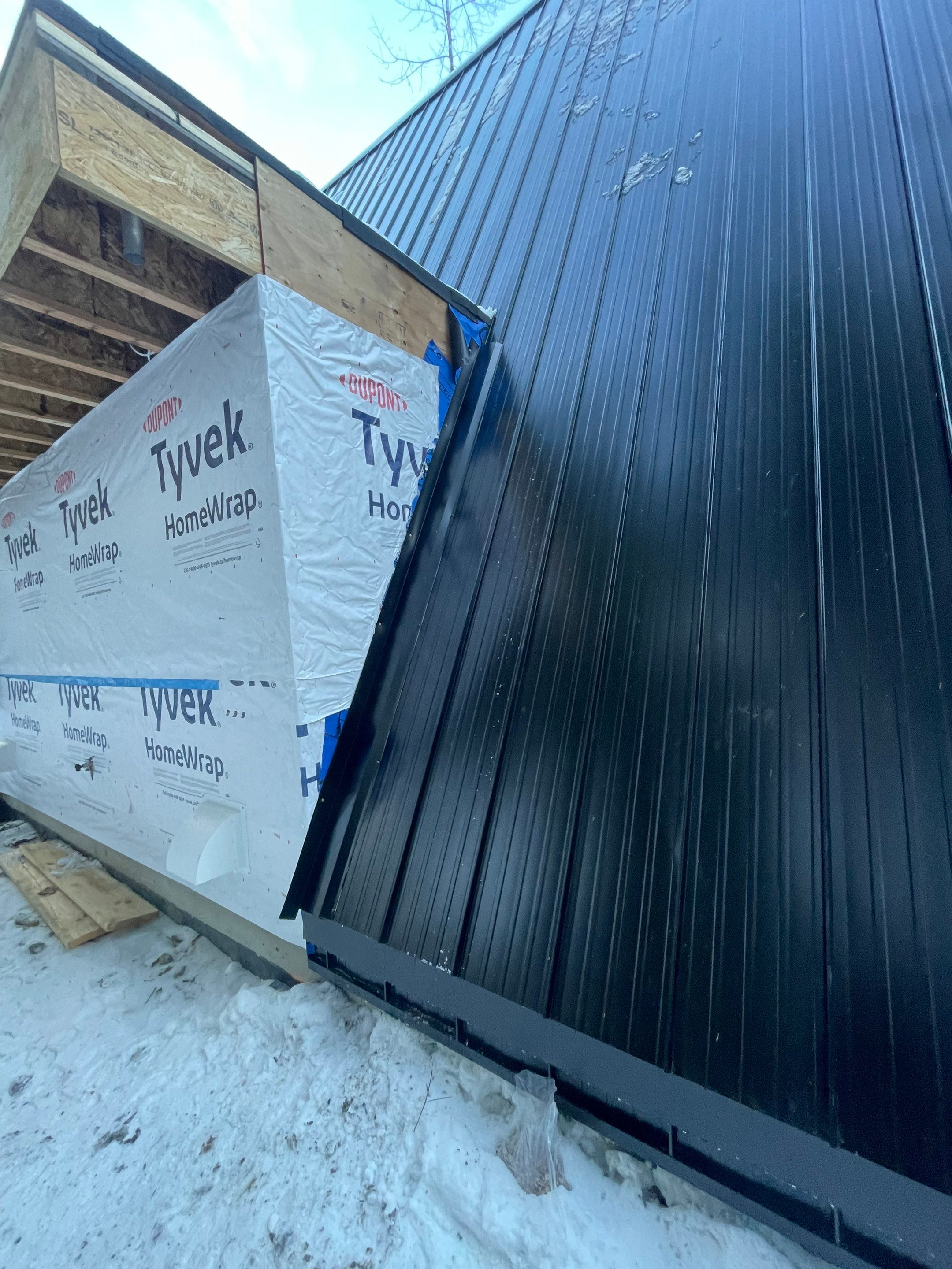 Residential Roofing Installation using 12" Prolok metal  by Top Notch Roofing Inc