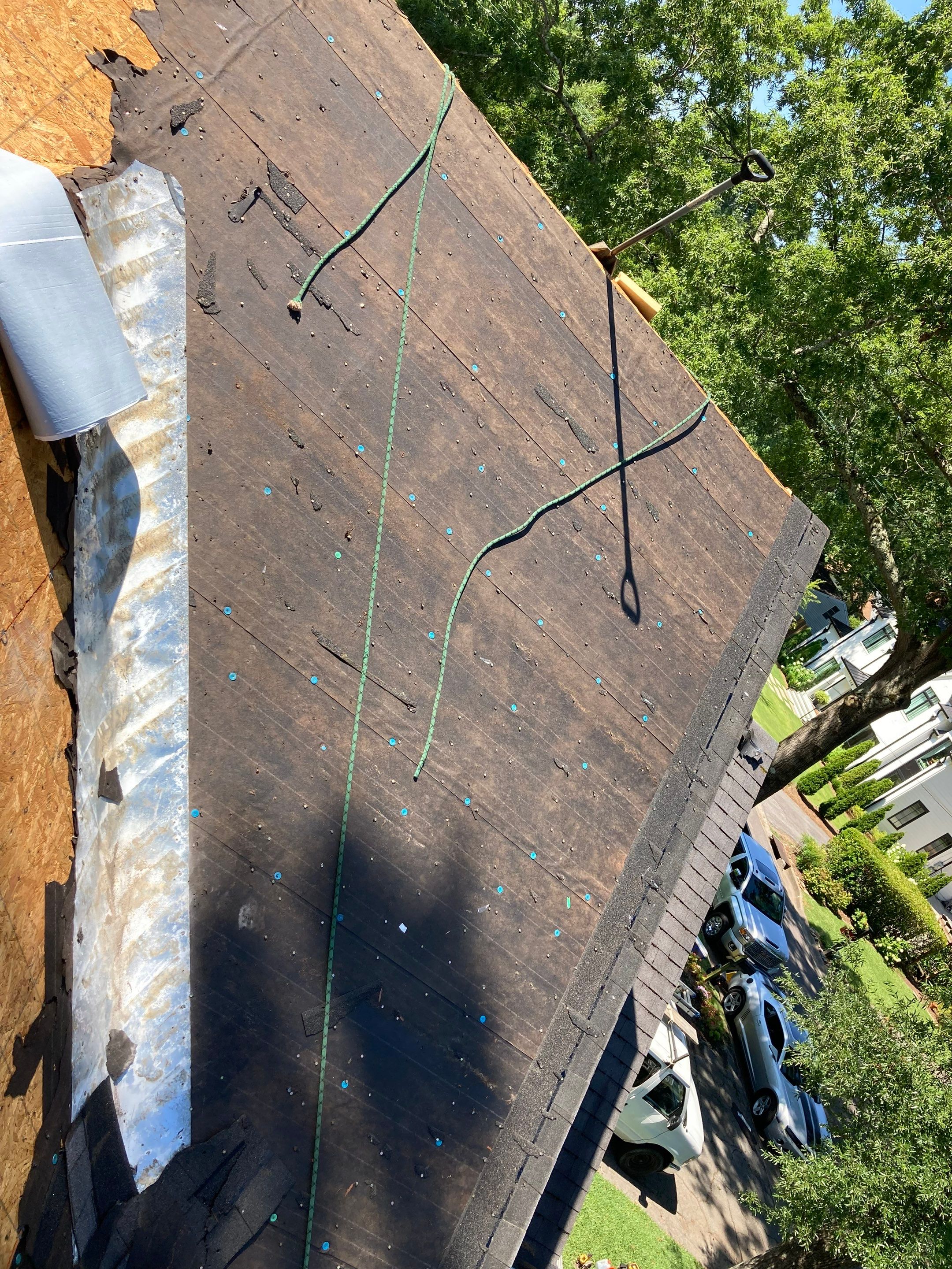 Residential Roofing Installation using Architectural Shingles by The Roofing Dudes
