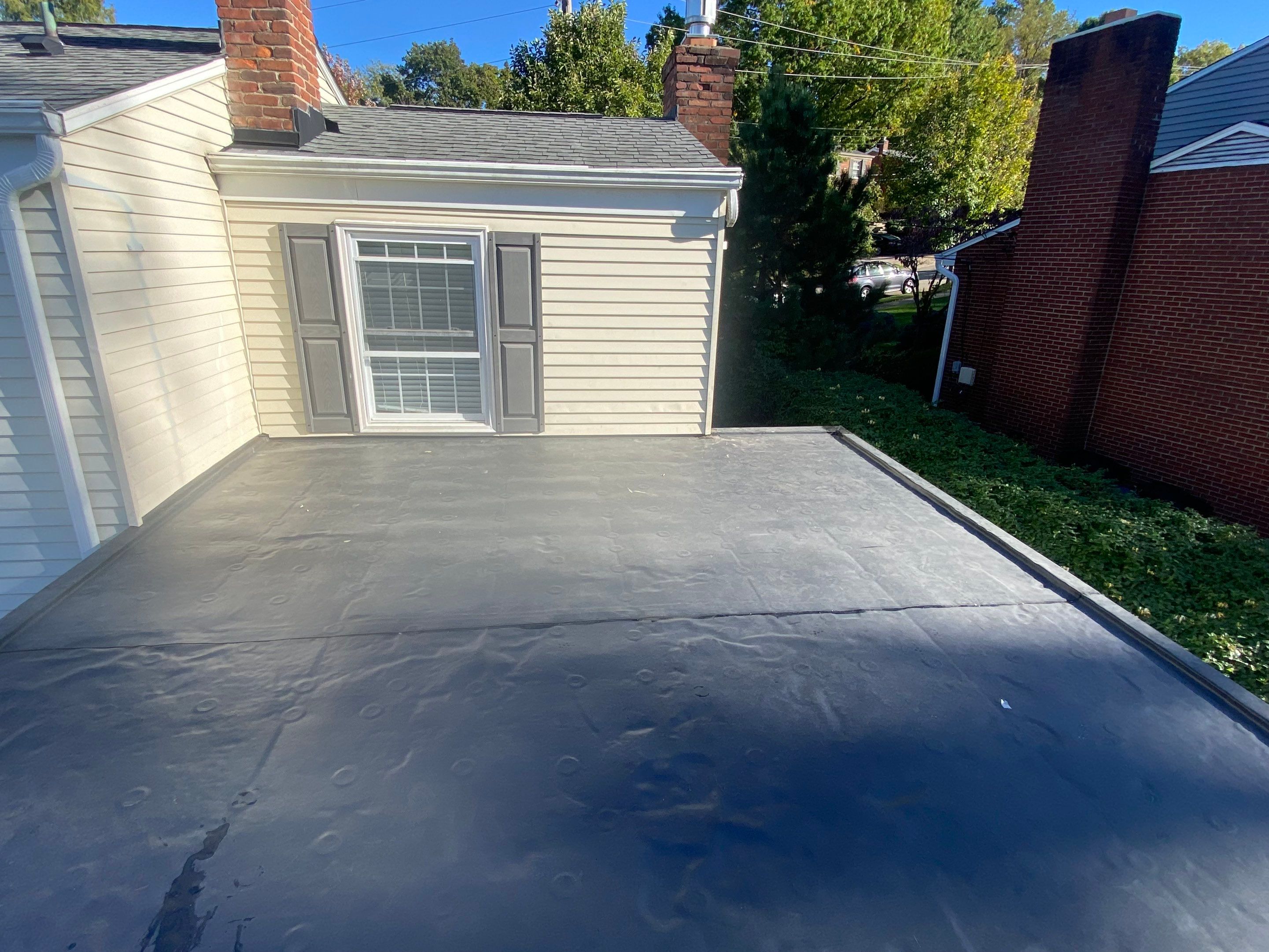 Low-Slope EPDM Rubber Roof Construction in Pittsburgh by Cousins Roofing Siding & Decks