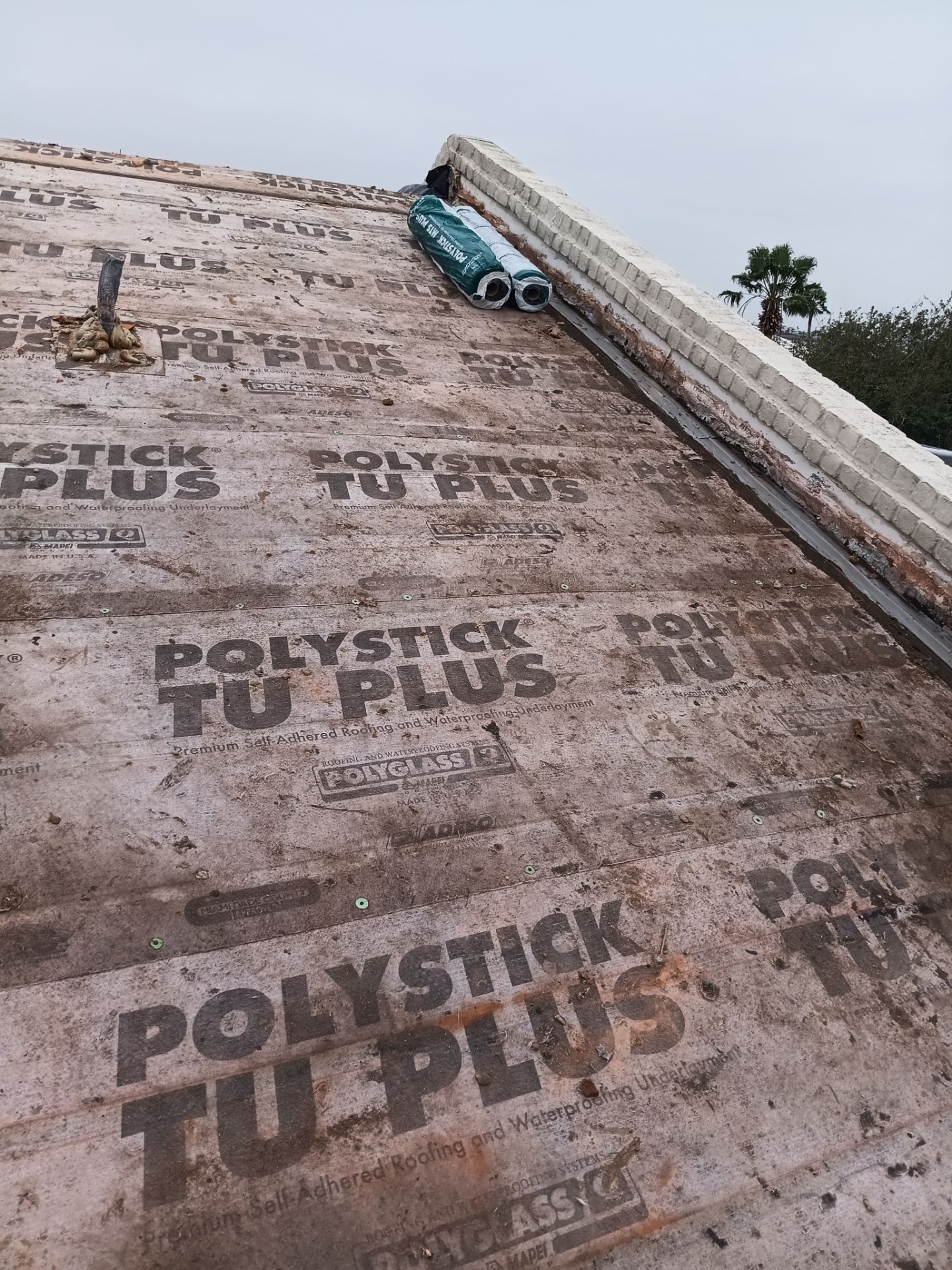 Off with the Tile and on with the TILCOR stone coated metal.  by Bayfront Roofing and Construction