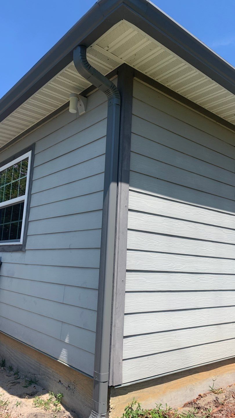 Gutter Installation Using Charcoal Grey K-Style Seamless Aluminum Gutters by Gutter Professors