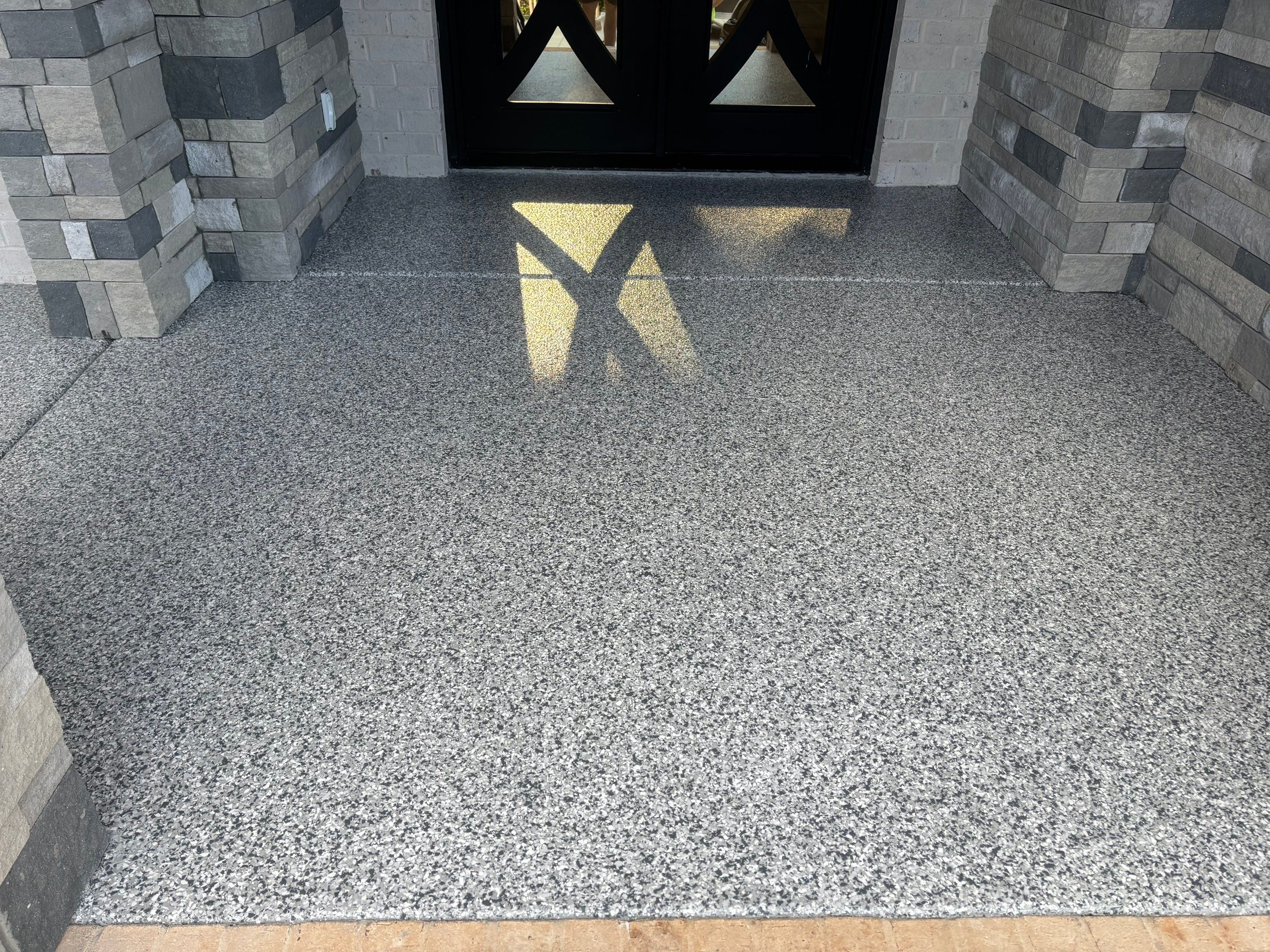 Porch & Garage Using Tidal Wave & Gravel  by Elite Floor Solutions
