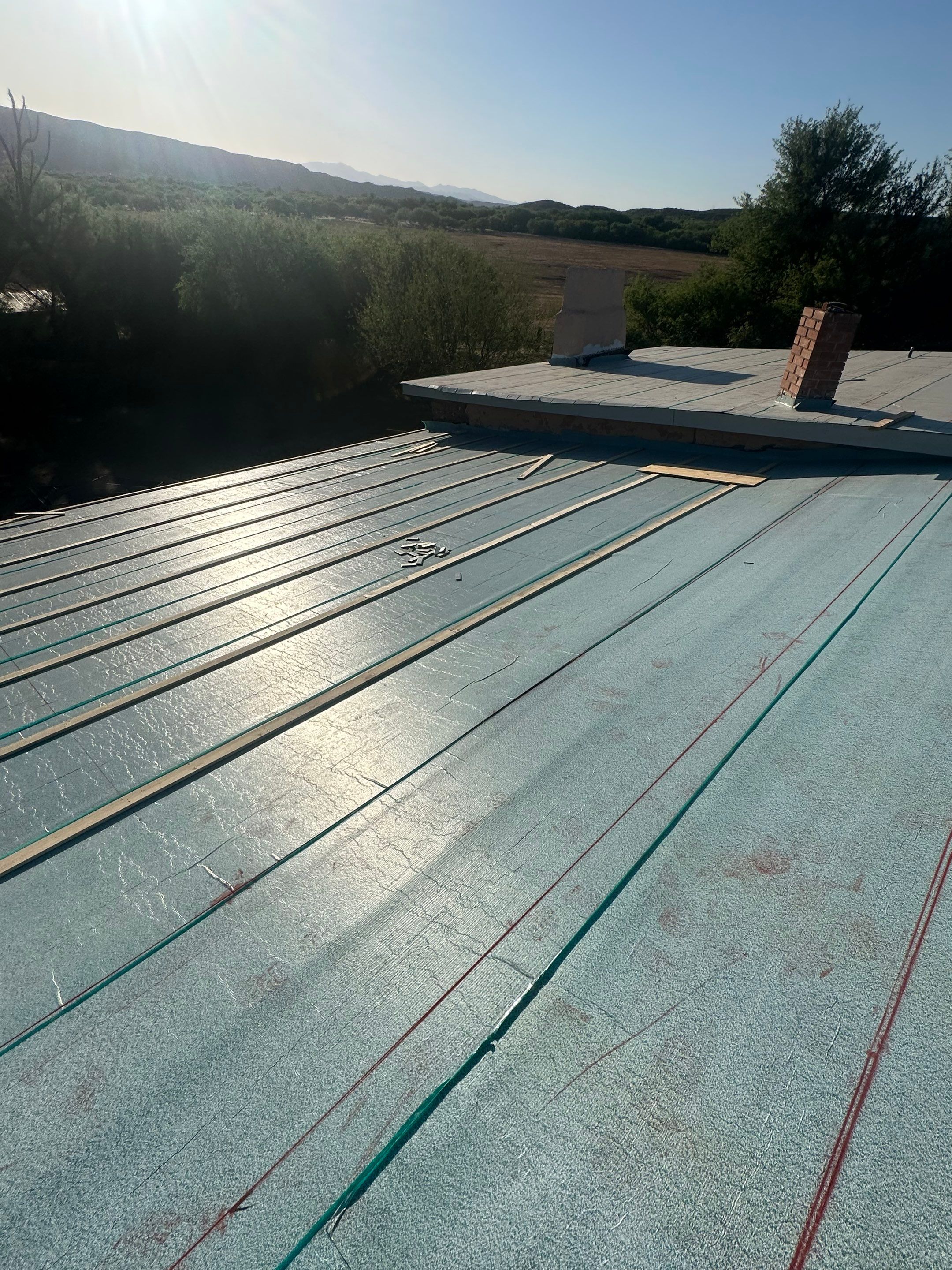 Bronze Standing Seam by Reimagine Roofing