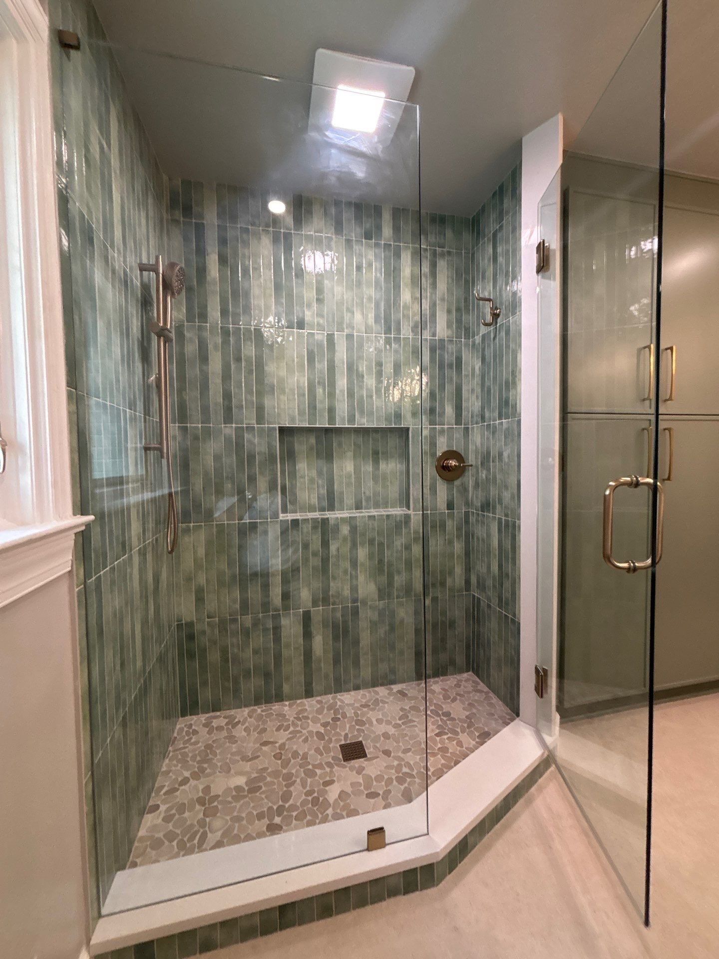 Finished Tiled Bathrooms by Next Step Contracting