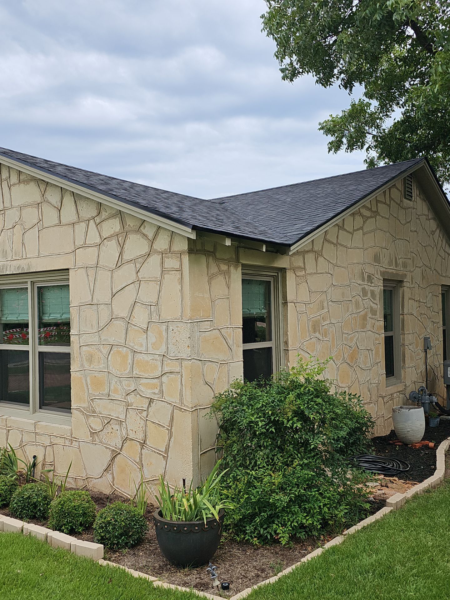 Residential Roofing Installation using Owens Corning Oakridge Onyx Black by DeZign Roofing & Exteriors