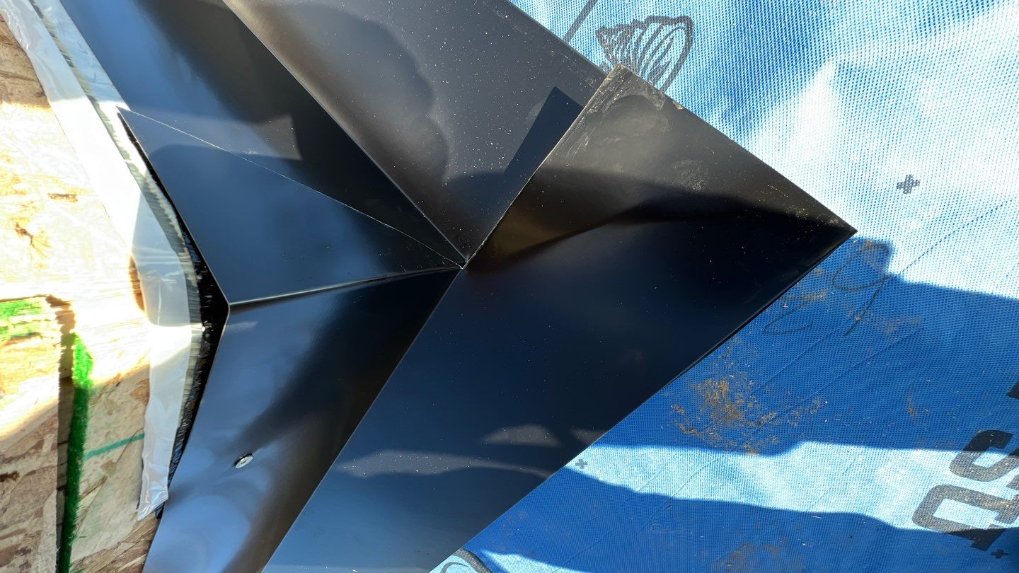 Residential Roofing Installation using 16" Prolok metal and Owens corning shingles by Top Notch Roofing Inc