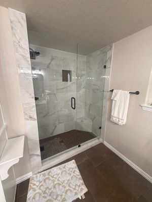 Bathroom Remodel with Marble Tile and Granite Vanities in Argyle