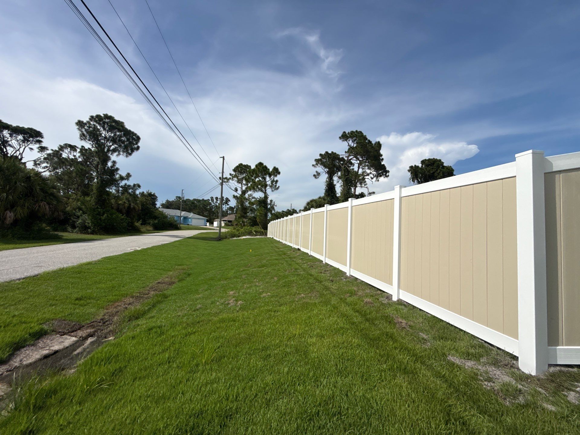 Custom Two-Tone Vinyl Privacy Fence Installation in North Port by True Fence LLC