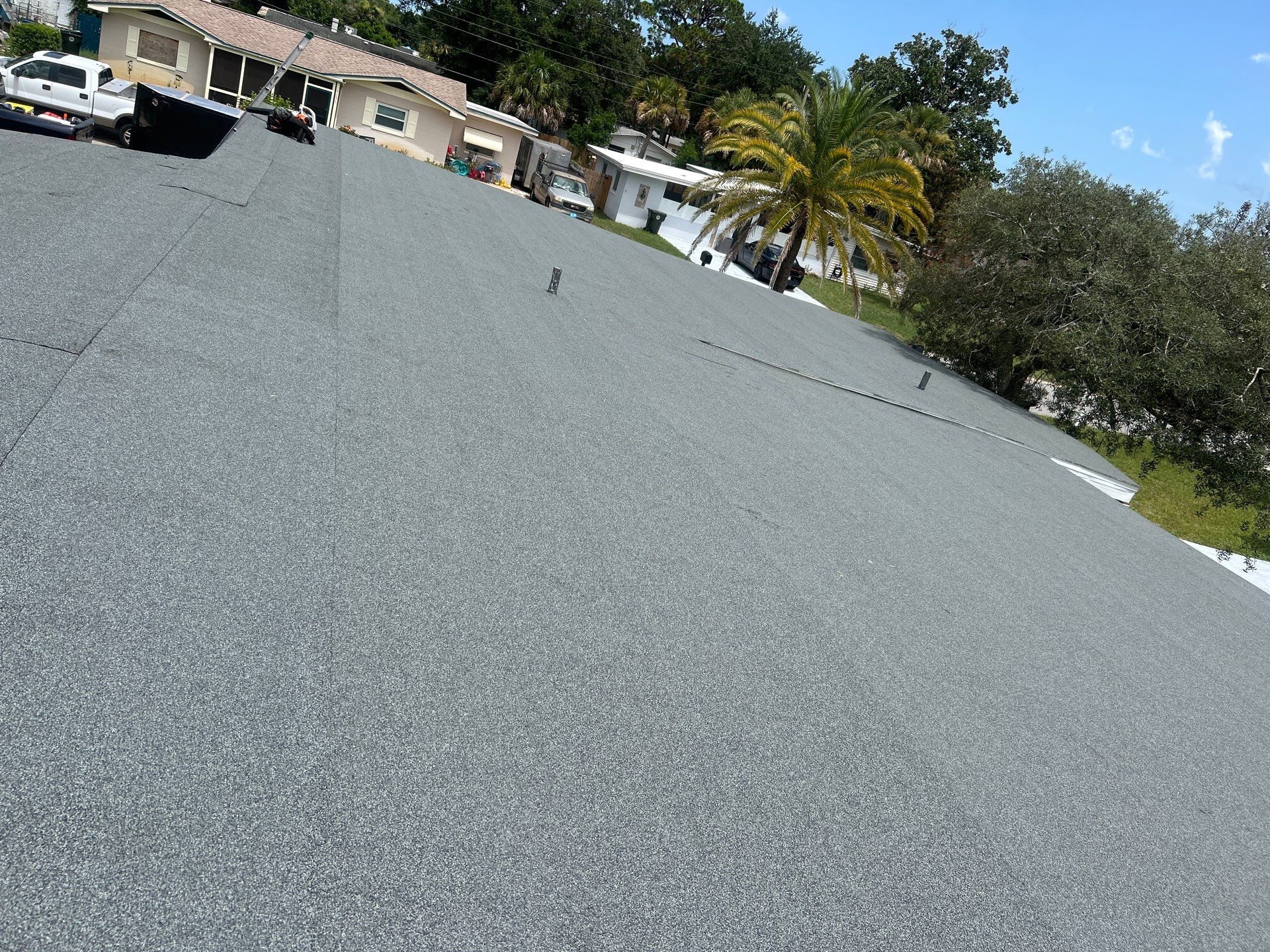 Colonial Slate Modified Bitumen Flat Roof Replacement in Daytona Beach by Pinnacle Roofing Group
