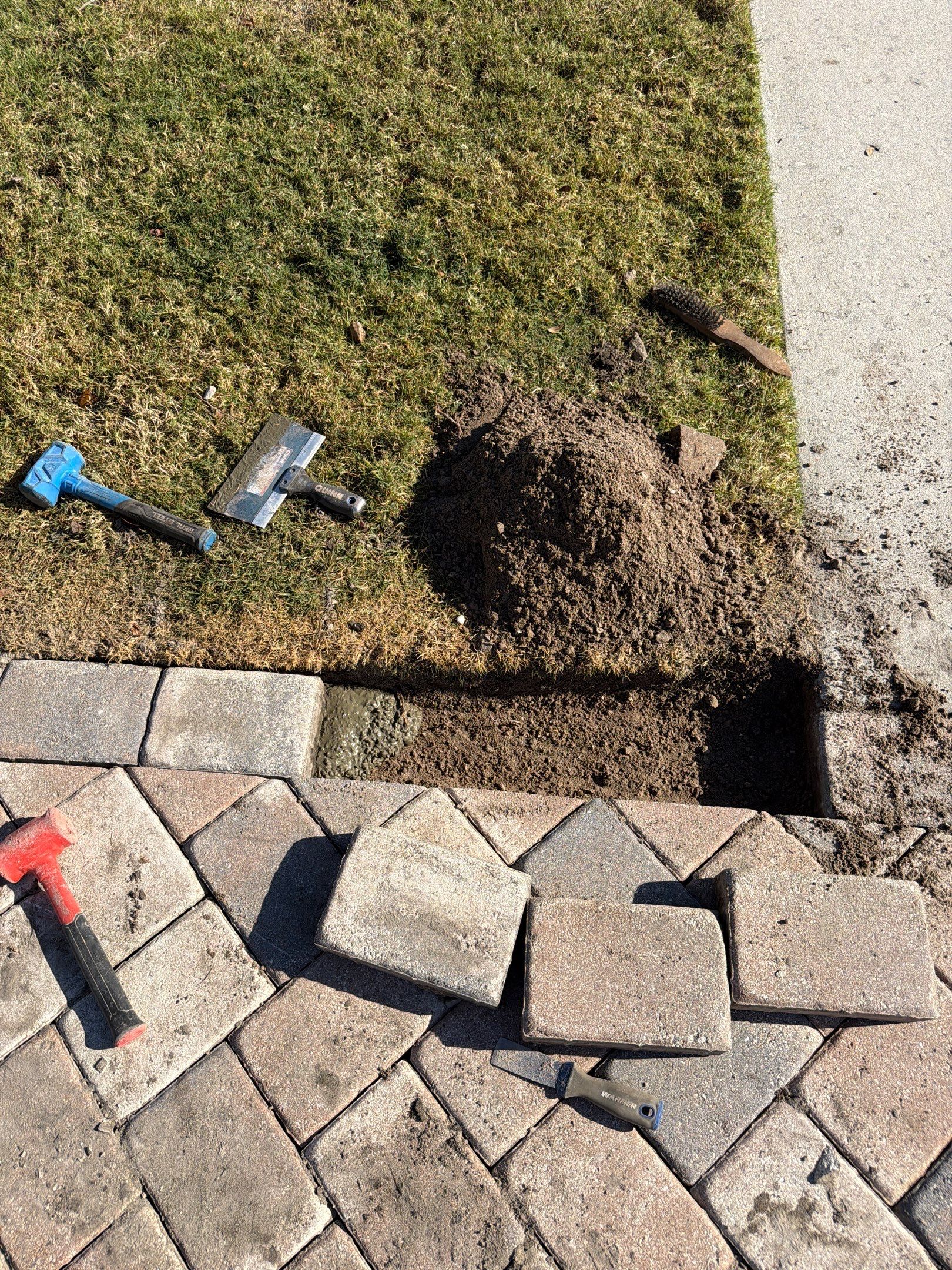Herringbone Paver Driveway Repair, Stripping and Sealing in Sun City Center by Supreme Paver Experts