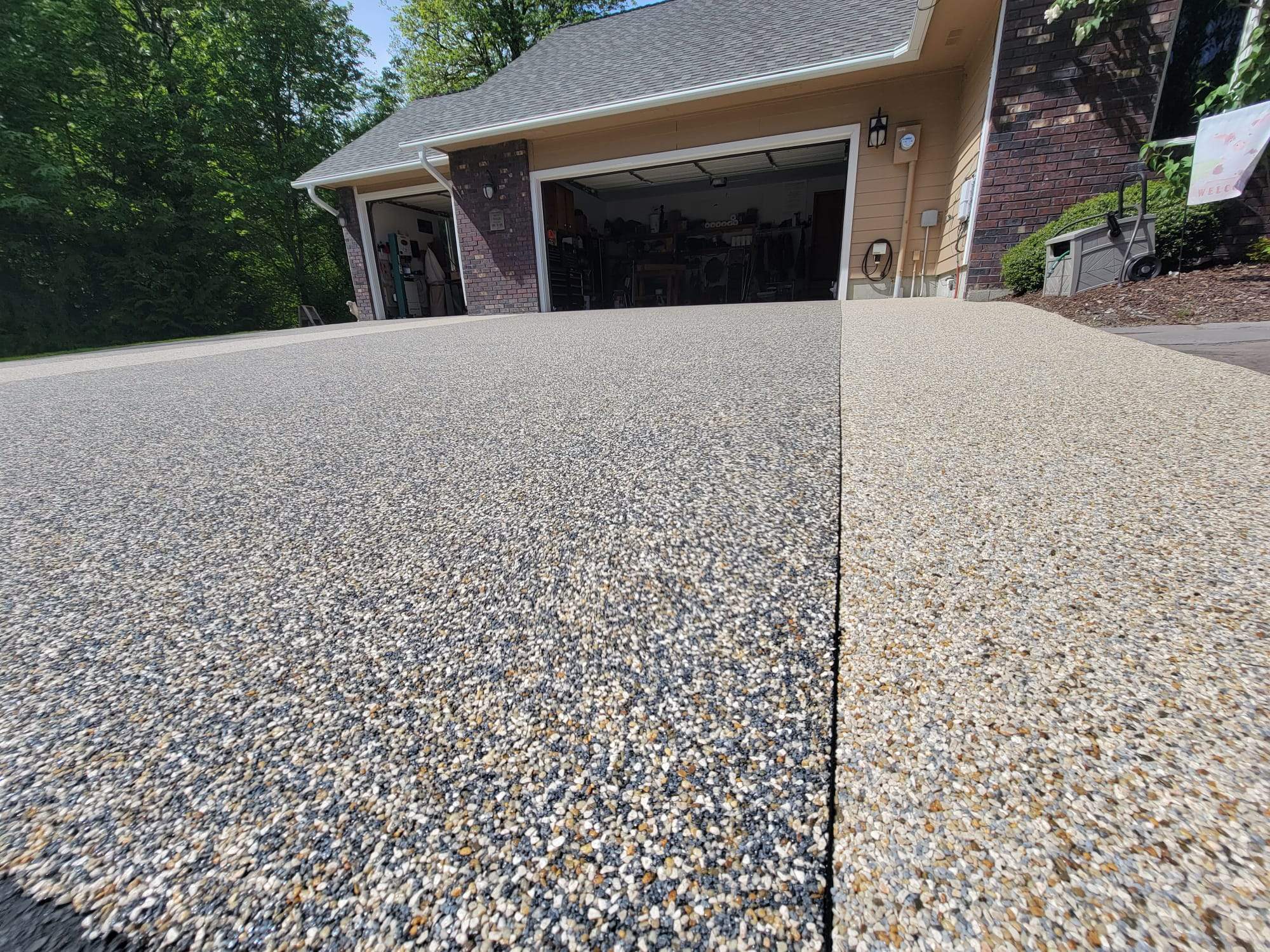 Luxury Driveway with Big Sur and Sistine Chapel Borders by Concrete Coating Experts Inc.