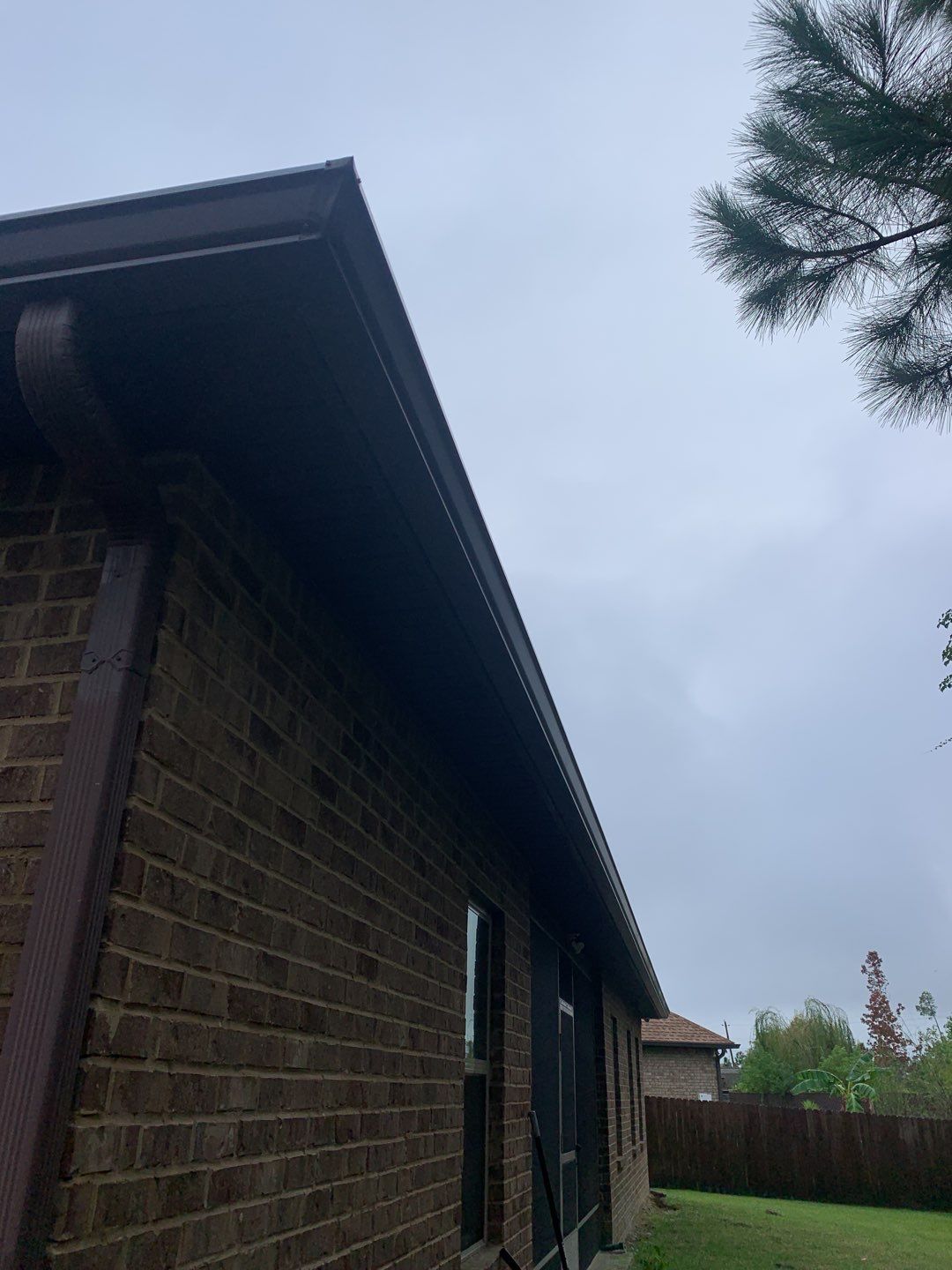 Replace gutter using Royal Brown in Panama City FL by Gutter Professors