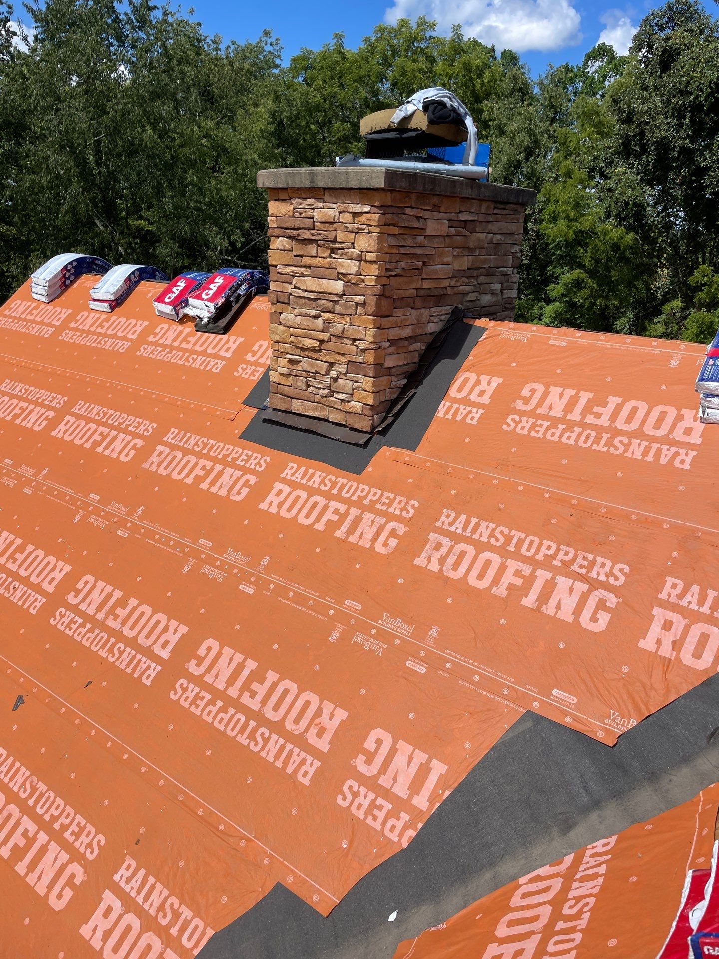 Residential Roofing Installation using GAF TImberline HDZ Hickory by Rainstoppers Roofing