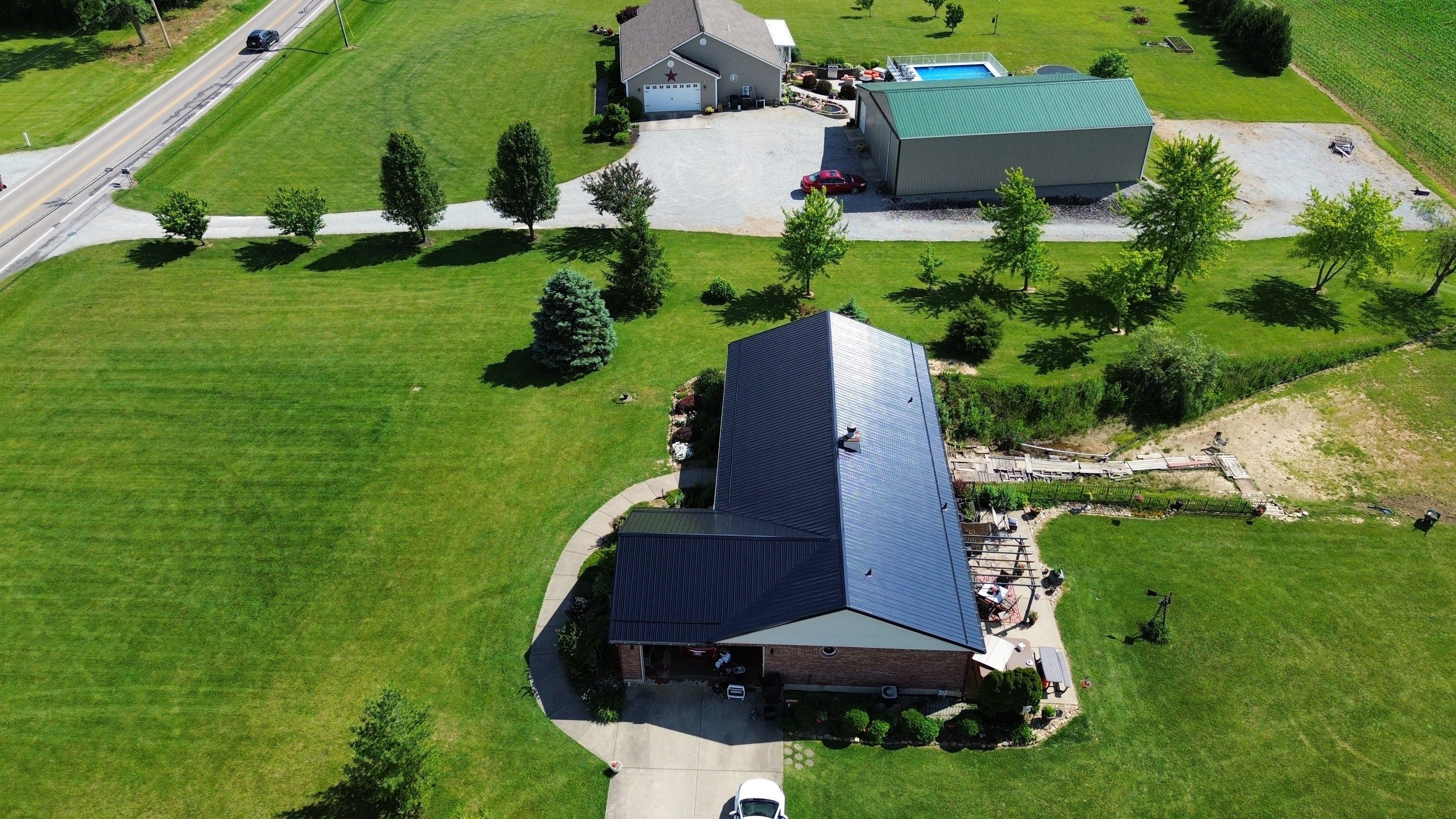 Residential Roofing Installation using Perfromance Panel Metal - Black by RoofX 