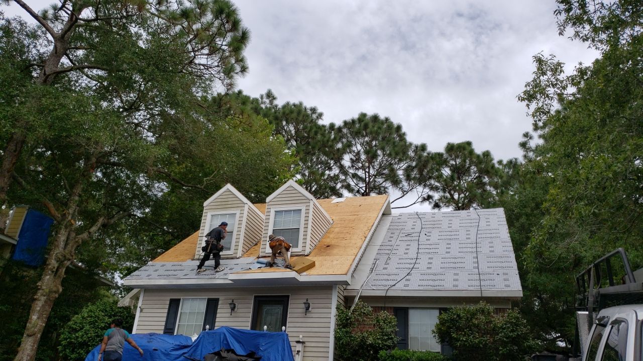 Residential Roofing Installation using Roof Replacement by American Roofing & Construction LLC
