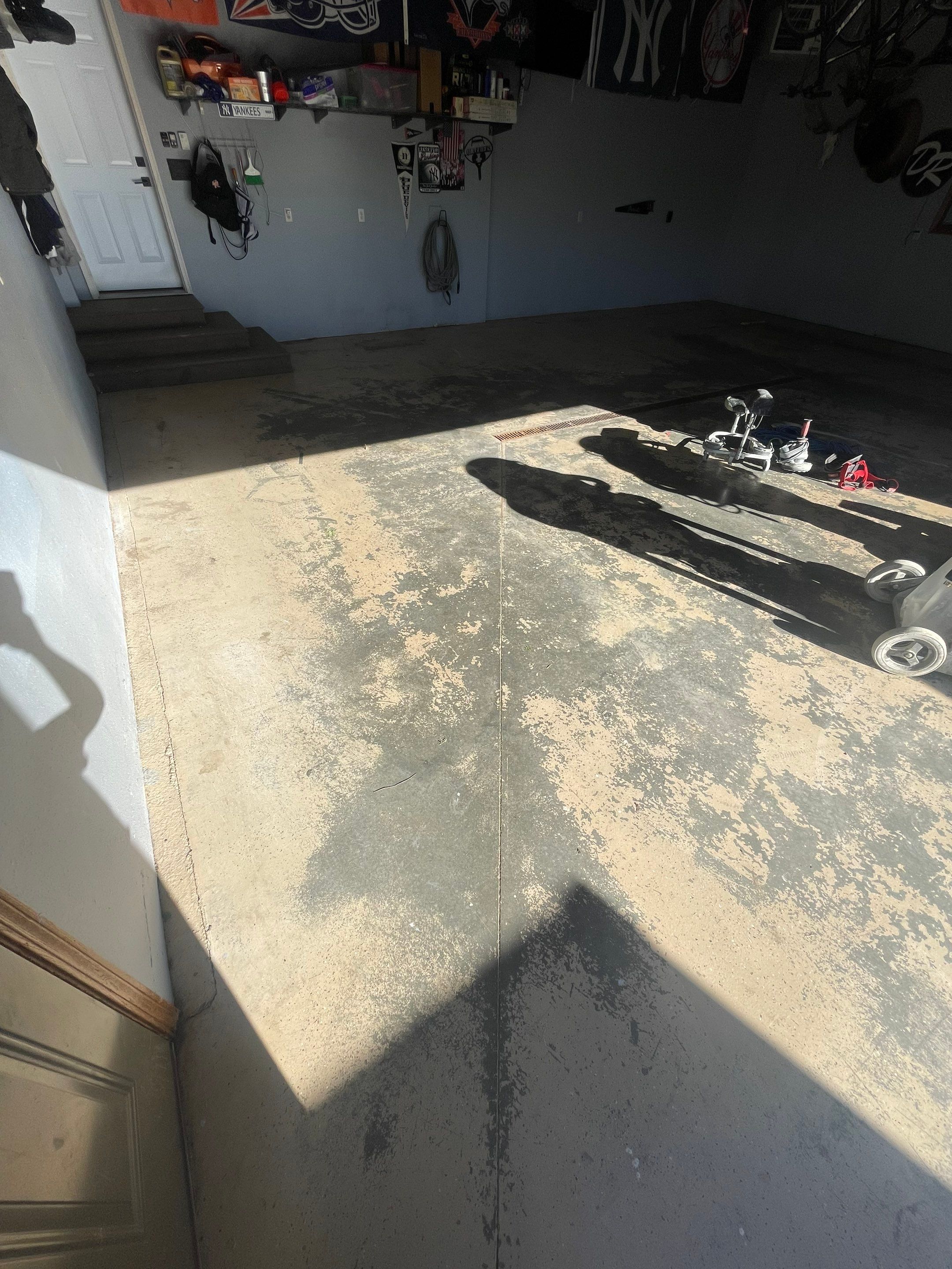 Full Garage Floor Epoxy Coating Installation in Dell Rapids by Select Painting, Coatings & Garage Cabinets