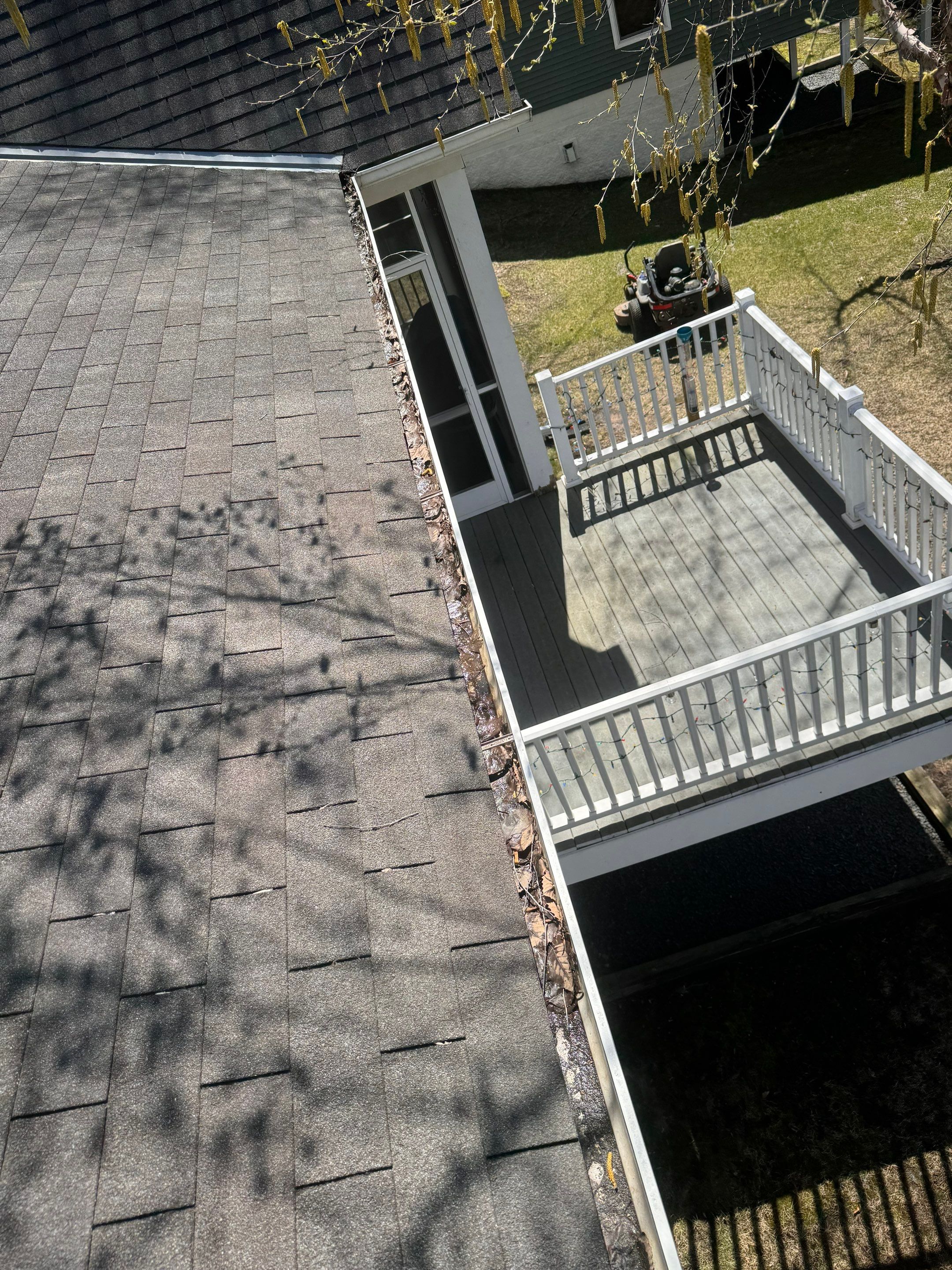 Commercial gutter cleaning Georgia before photo with filled gutters
