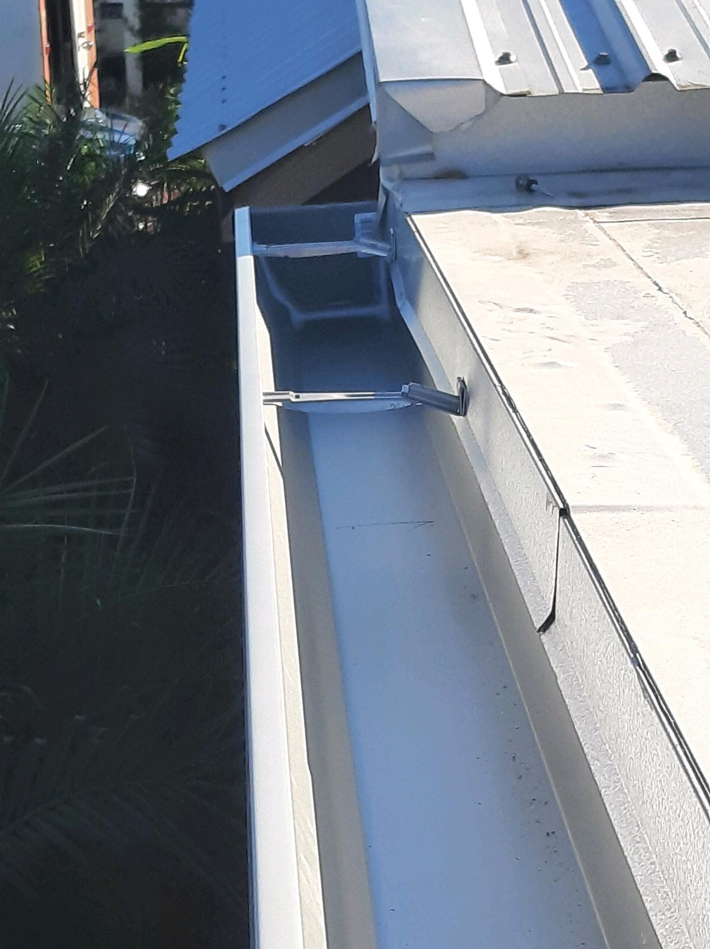 Gutter Installation using K-Style Seamless Gutters and Soffit and Fascia Replacement by Gutter Professors