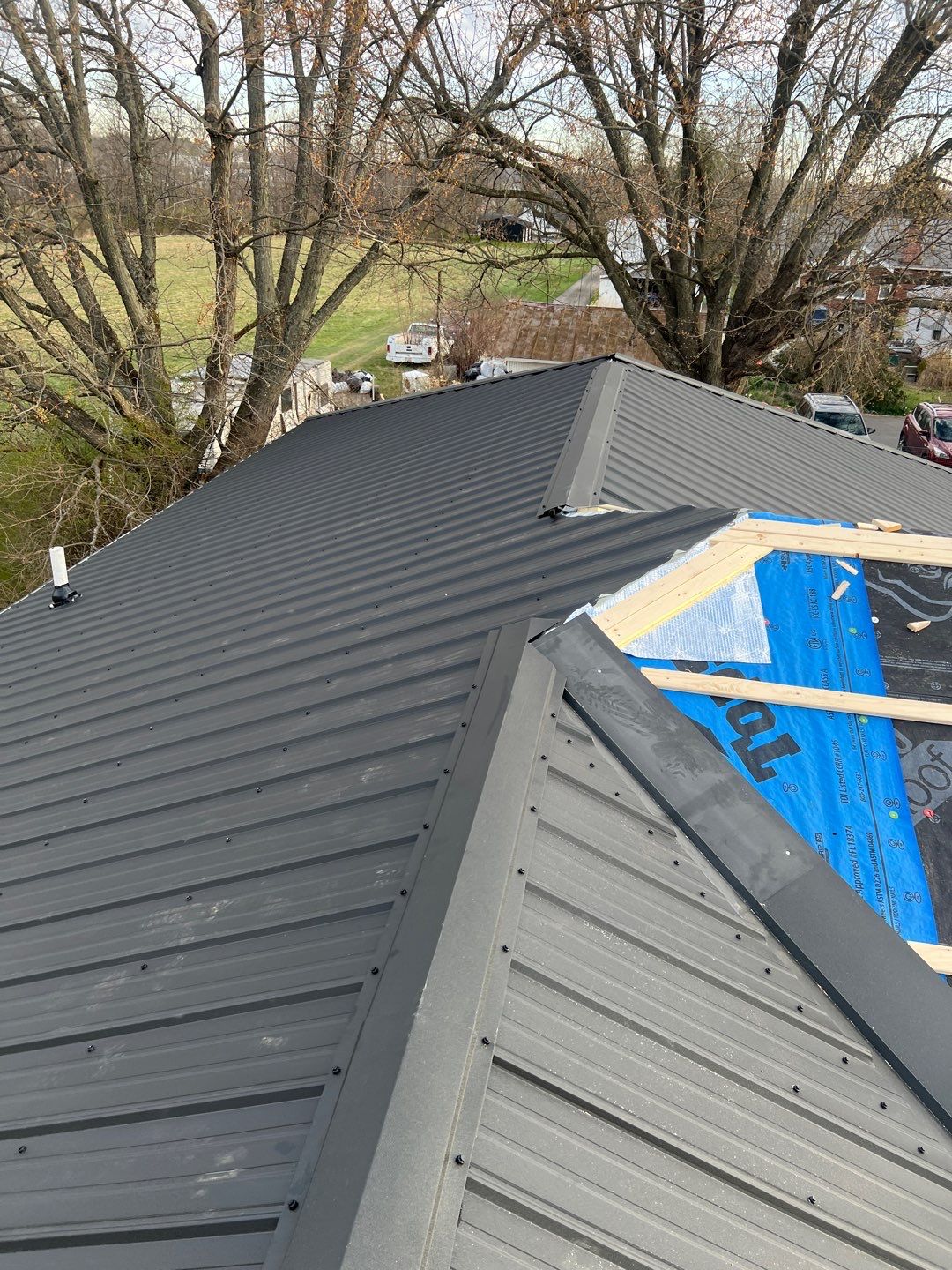 Commercial Roofing Installation using Performance Panel Metal - Frost Black by RoofX 