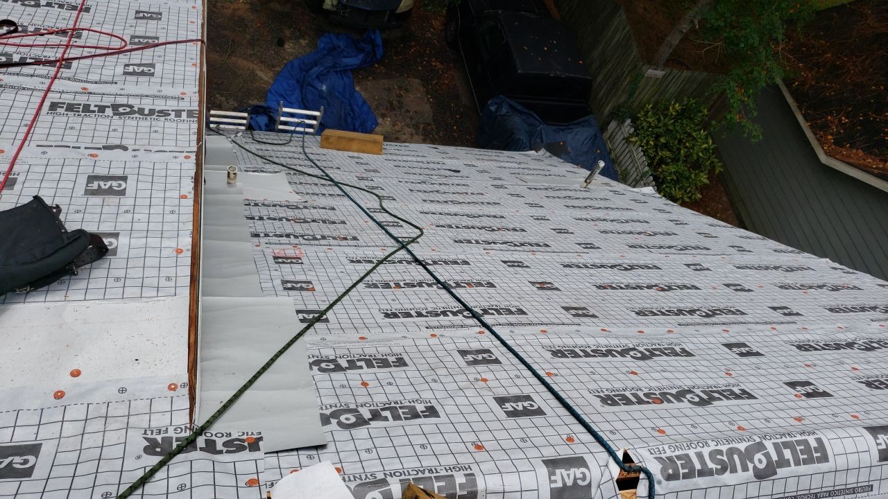 Residential Roofing Installation using Roof Replacement by American Roofing & Construction LLC