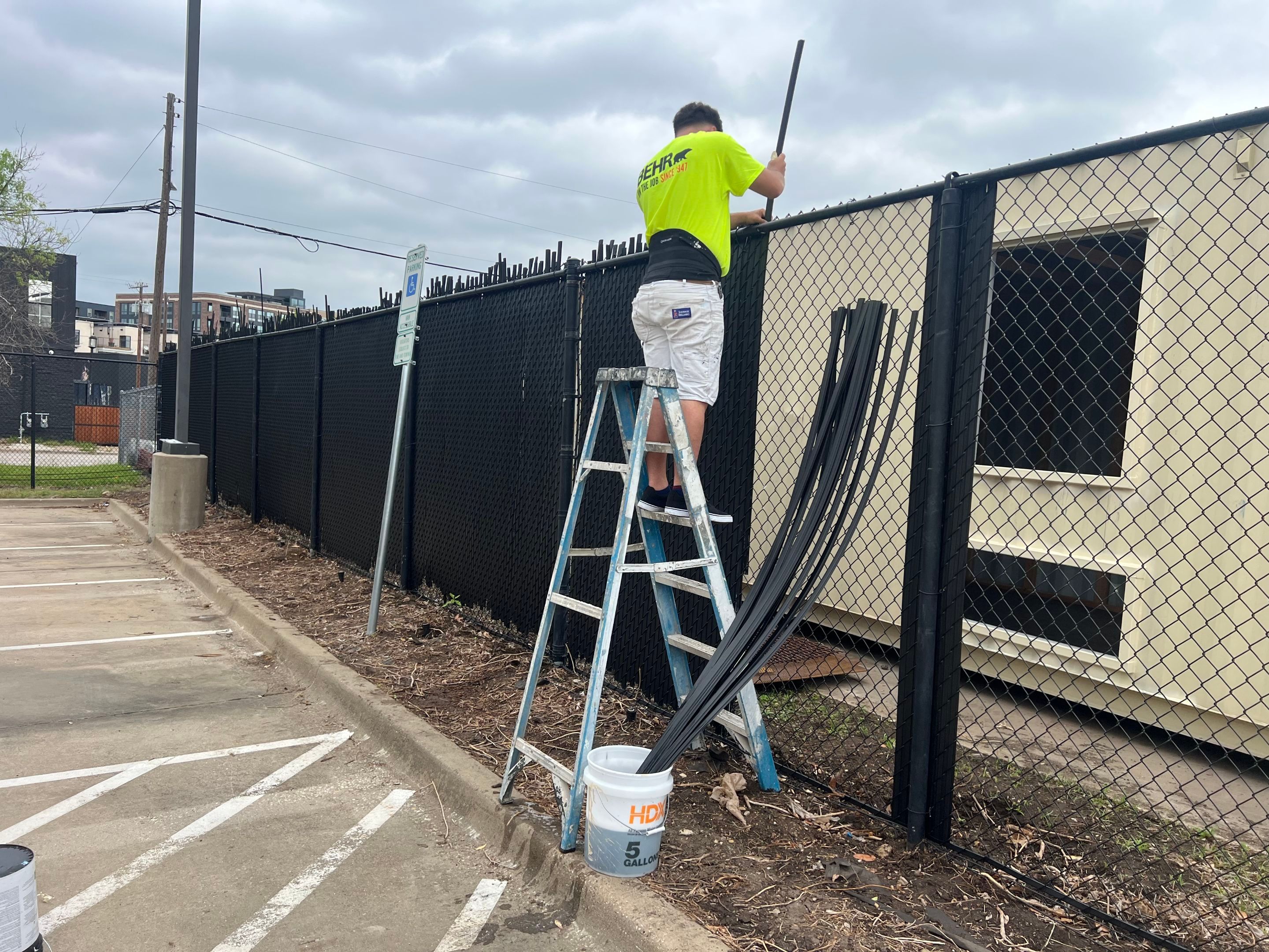 Chain link Privacy Slats by 3:16 Roofing and Construction