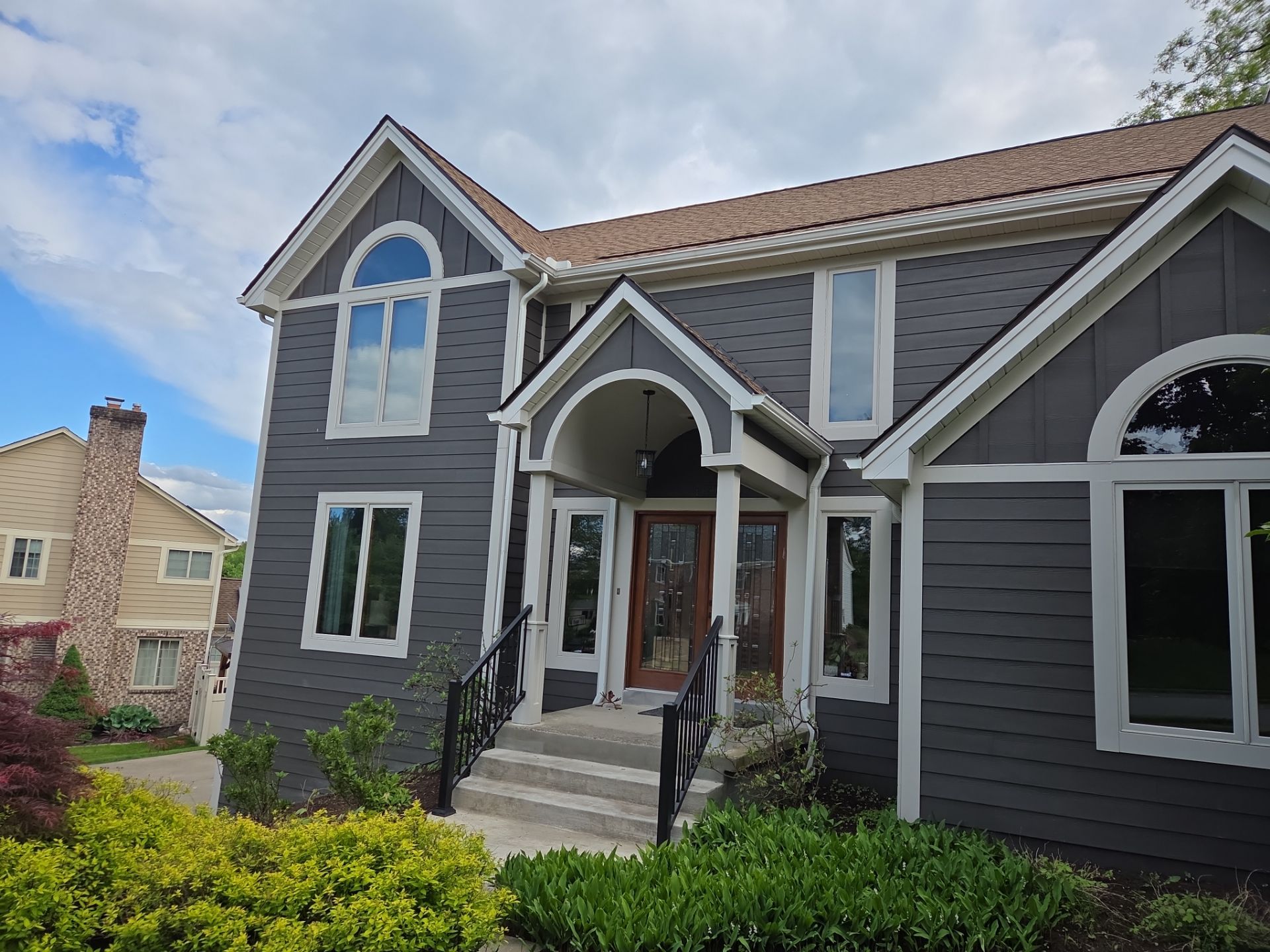 Full exterior remodel by Cousins Roofing Siding & Decks