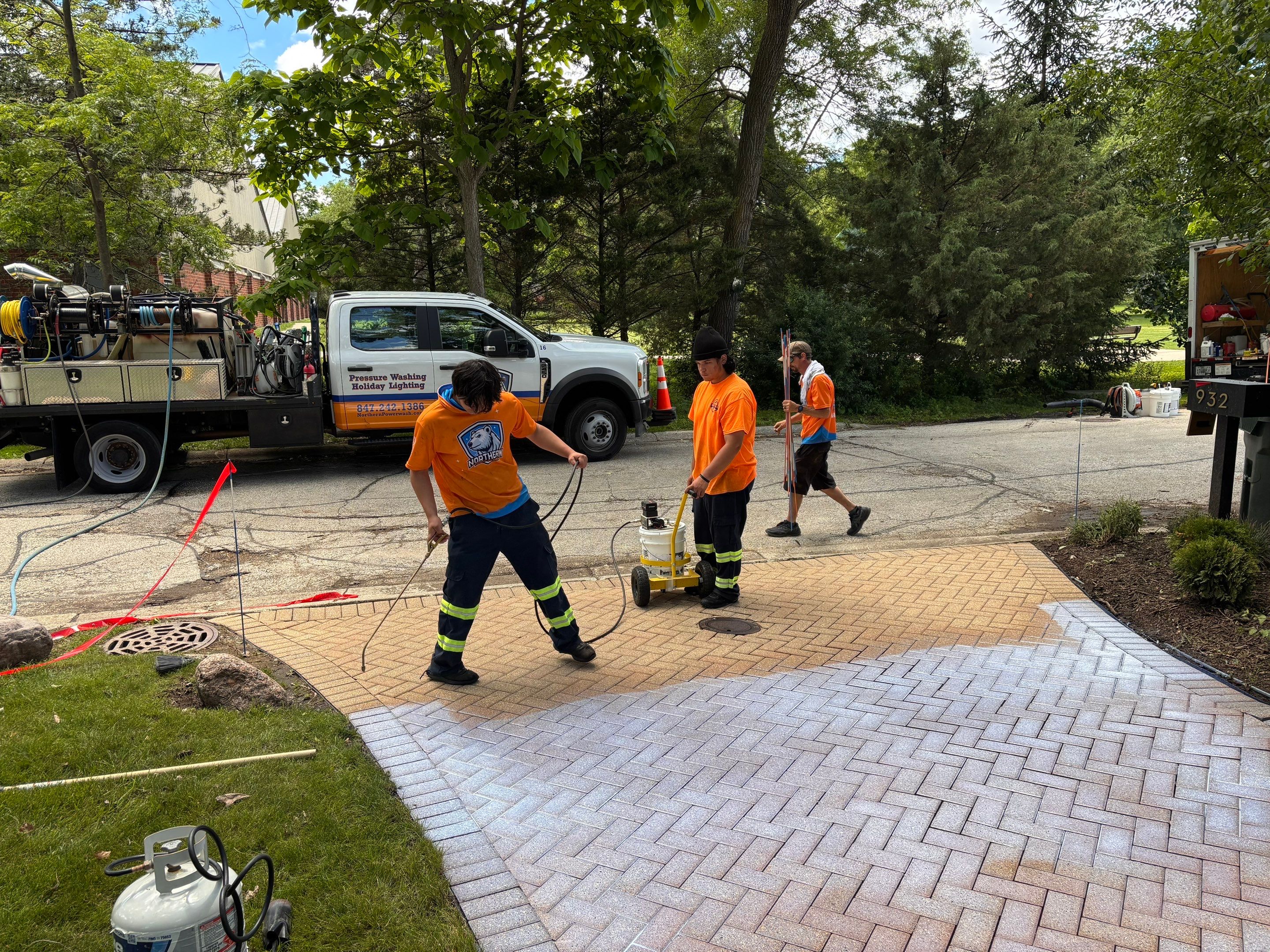 Brick paver repair, cleaning and sealing by Northern Power Washing LLC.