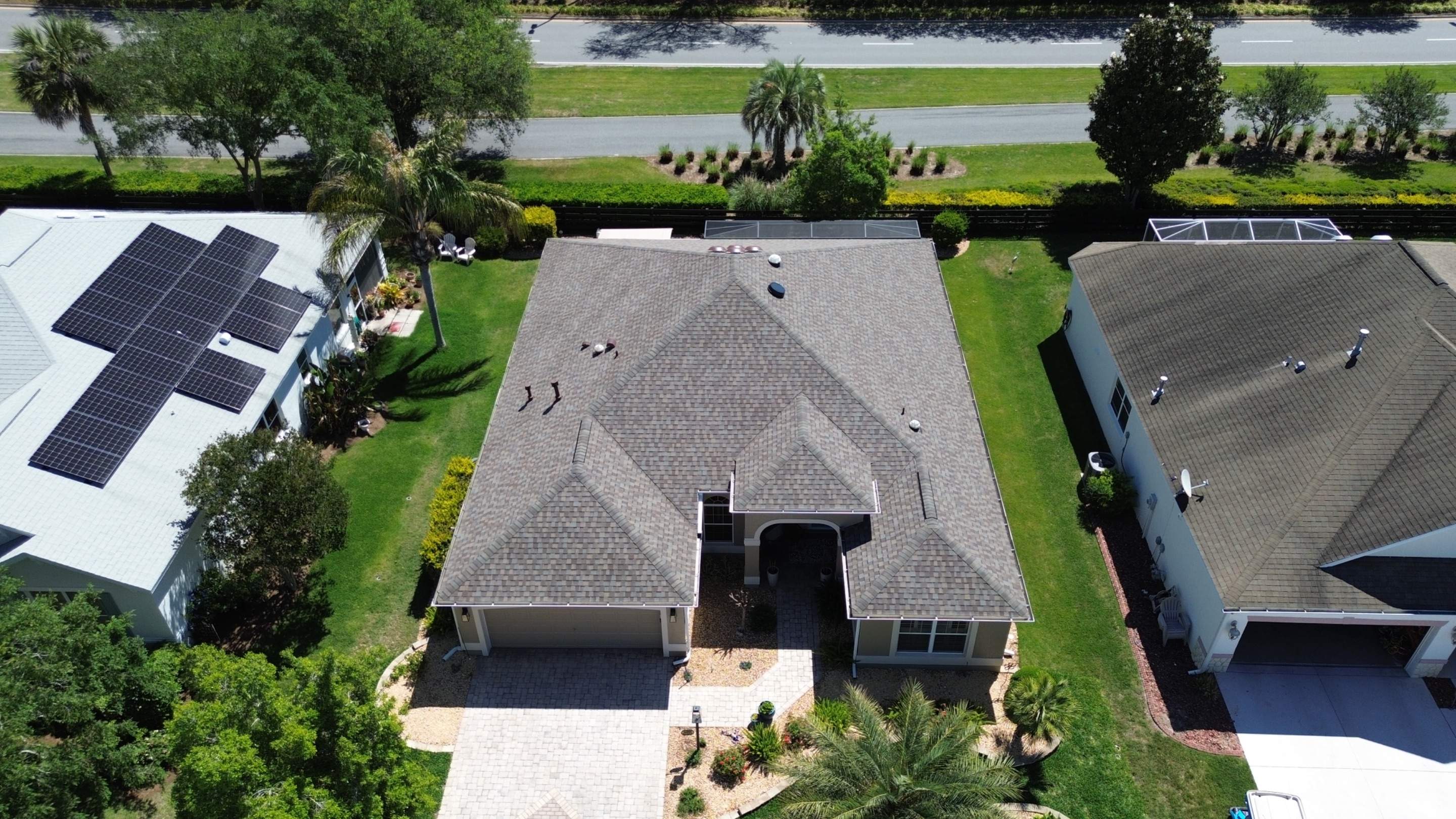 Before and after drone pictures in The Villages FL by Gold Key Roofing