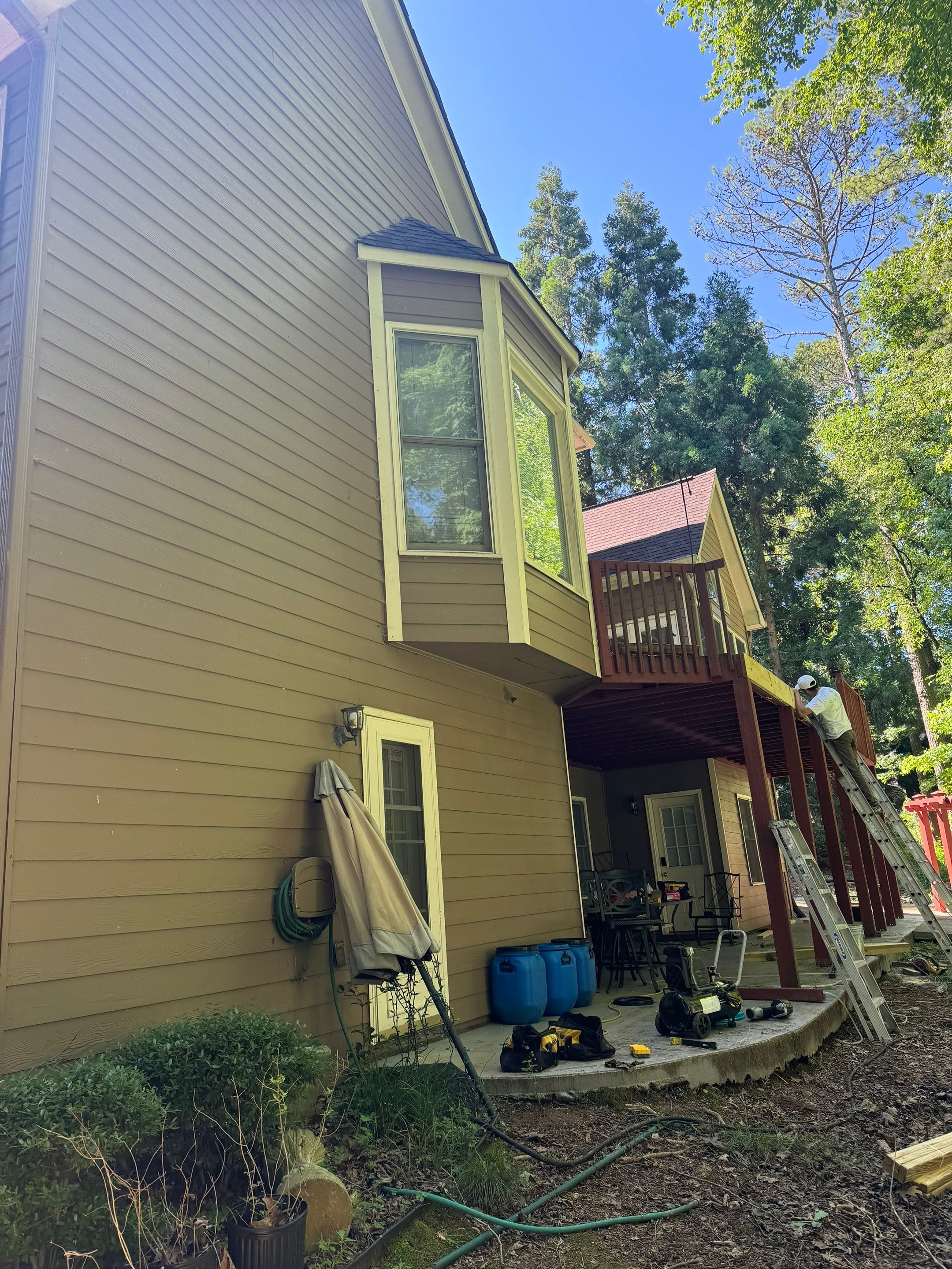 Exterior Painting and Comprehensive Wood Deck Repairs in Suwanee by Swift Home Renovations 