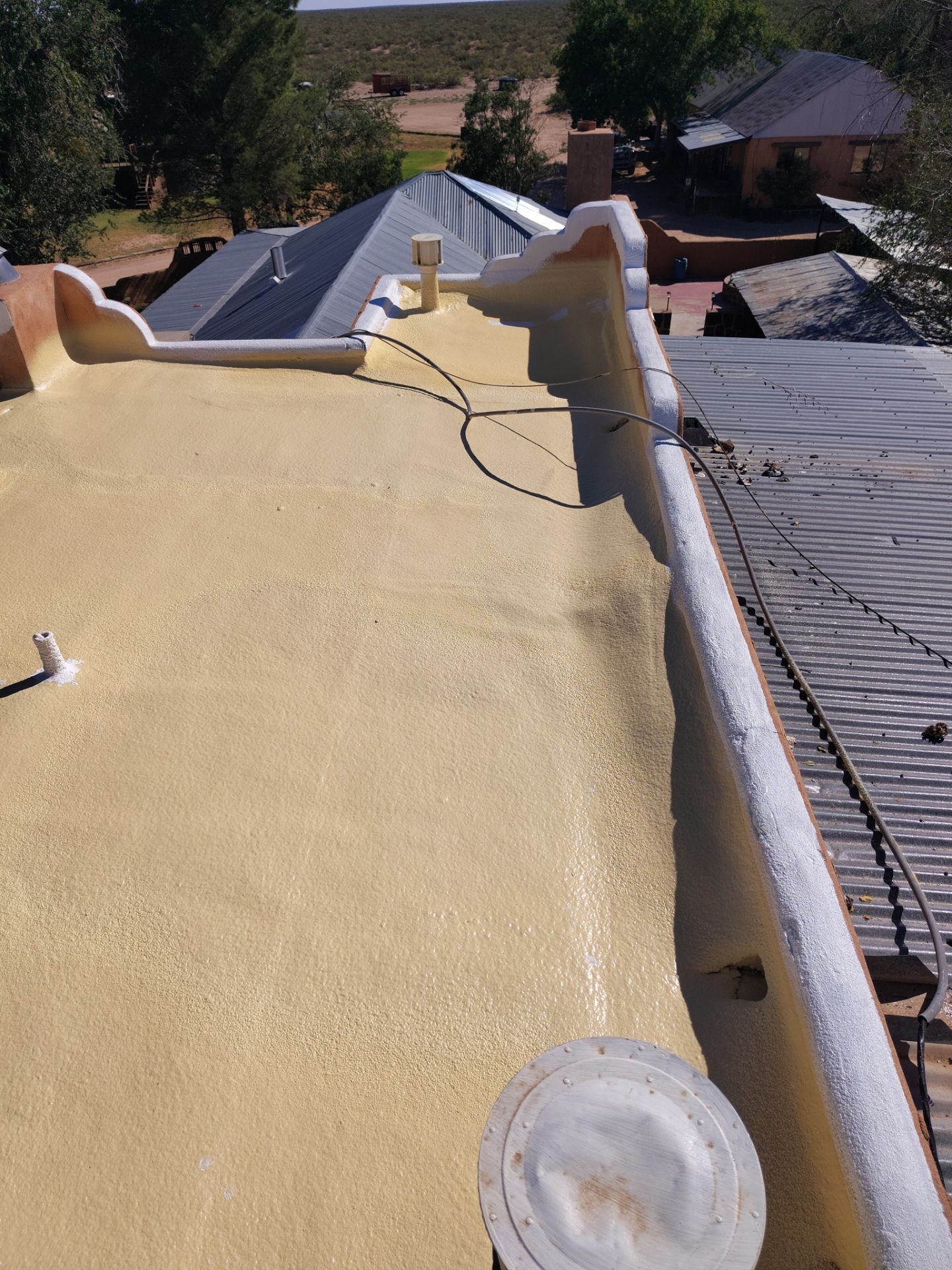 Residential roof application by SPF Services 