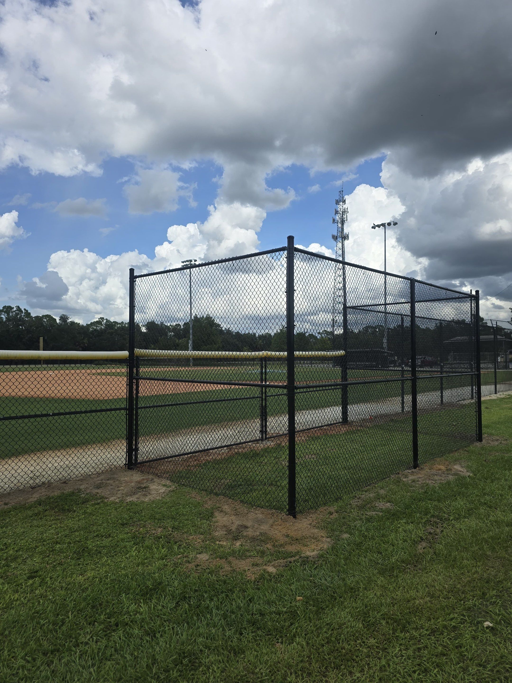 Commercial Black Chain Link Fence Installation in North Port by True Fence LLC
