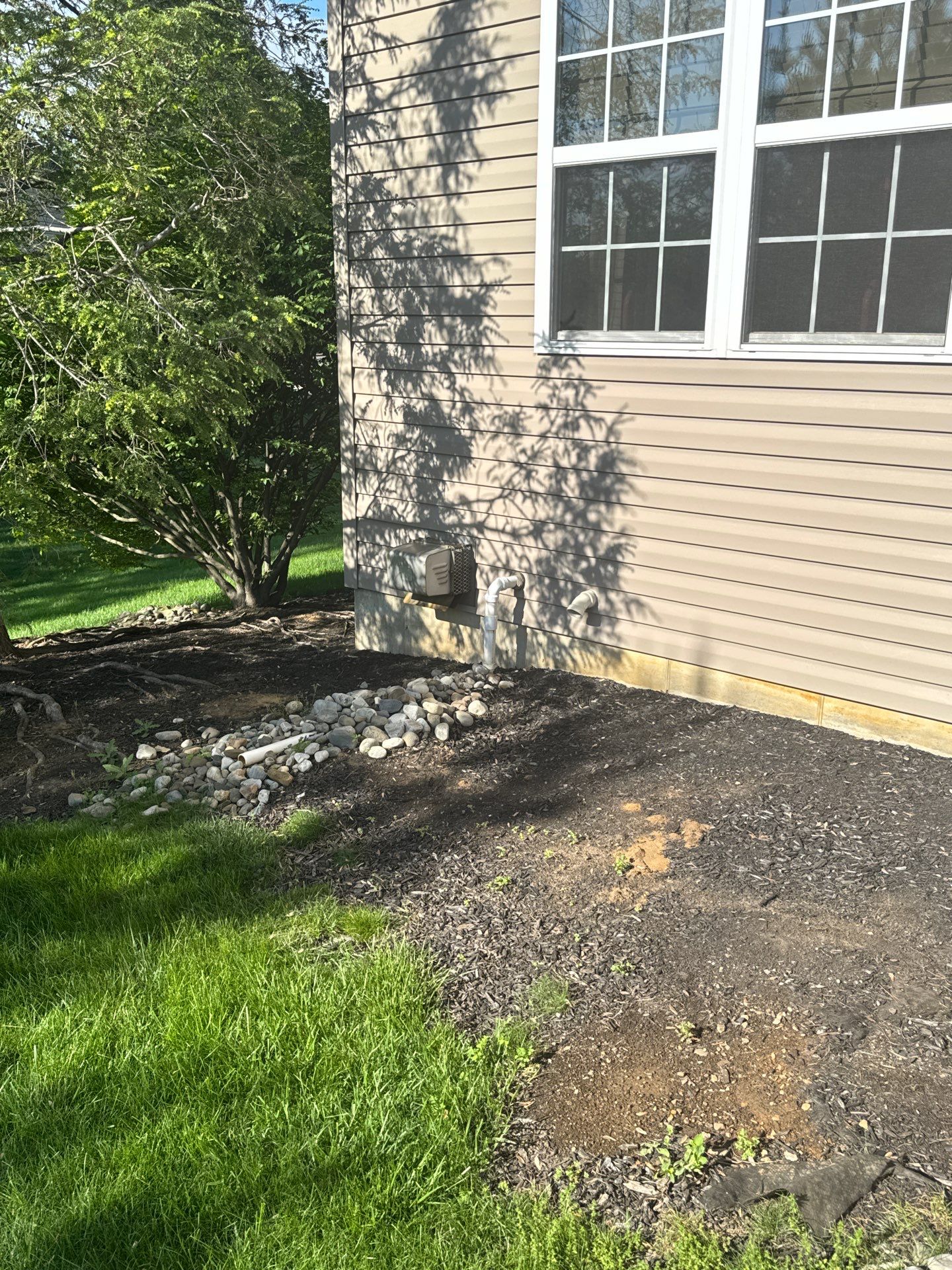 Backyard Retreat: Techo-Bloc Patio + Firepit Lounge by Saylor’s Lawn & Landscape