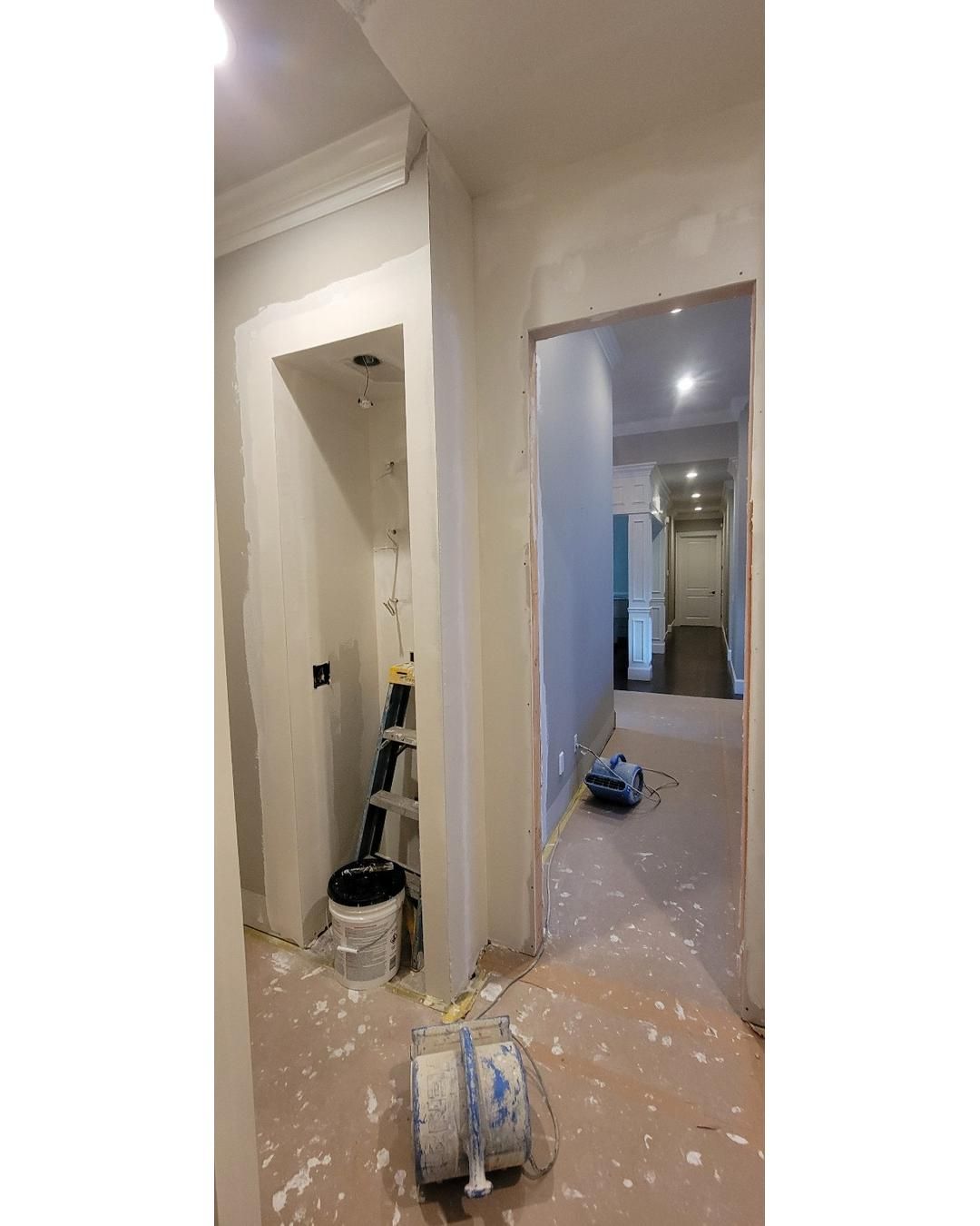 Closet transformation to coffee nook with custom shelves and LED lighting. by Crm Services Llc