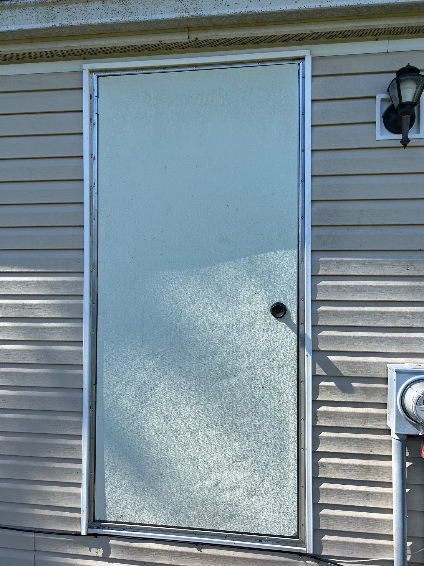Roof and Siding Replacement using Norandex Cedar Knoll Graphite Siding and Owens Corning Durations in Onyx Black by WIW Enterprises Inc