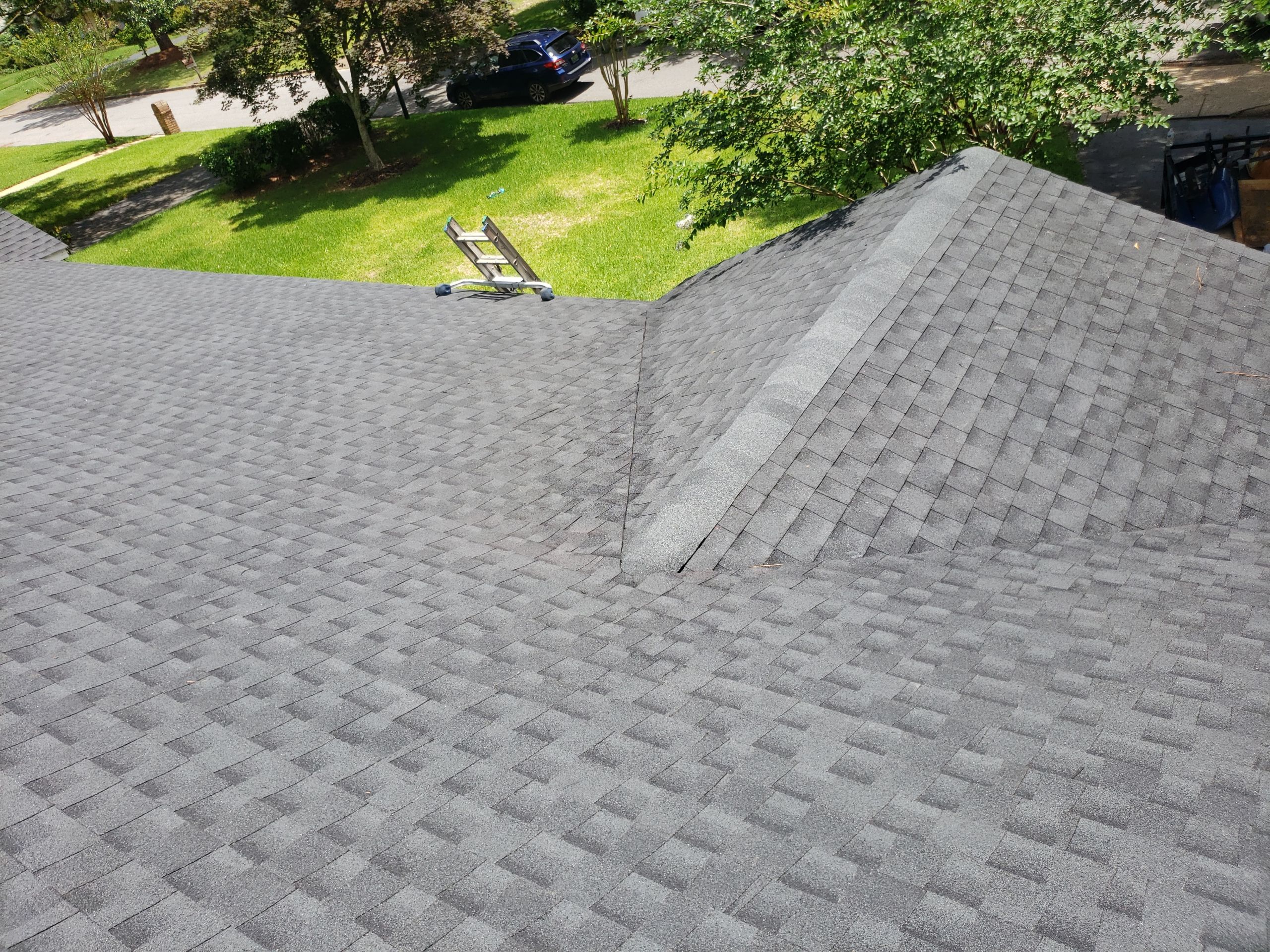 Residential Roofing Installation using Roof Replacement by American Roofing & Construction LLC