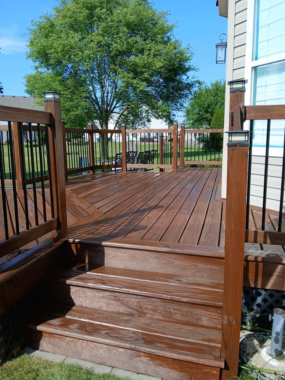 Tucker Deck Staining  by Two Brothers Residential Maintenance