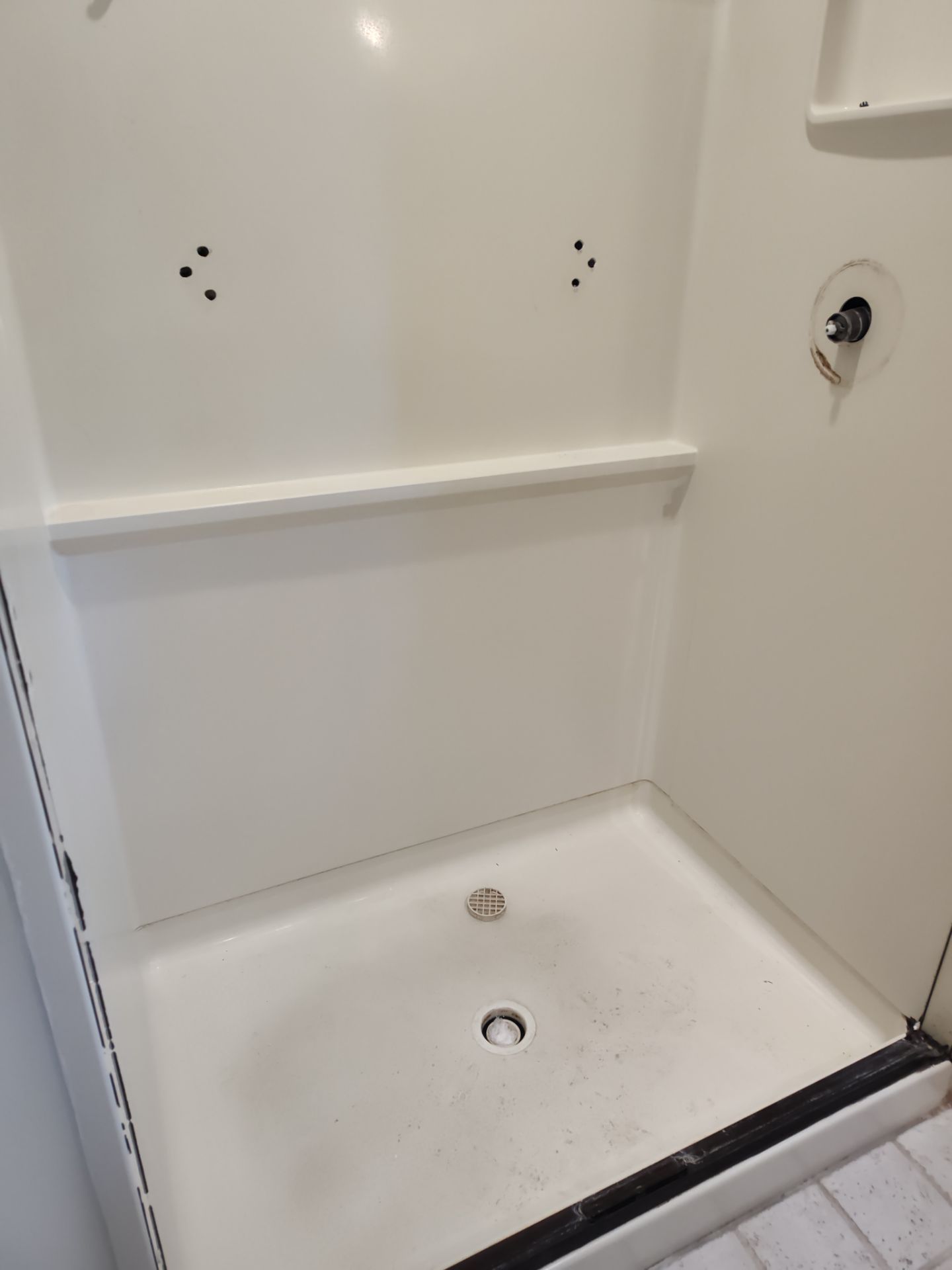 Bathroom Remodel using Onyx by Cornerstone Home Builders, LLC