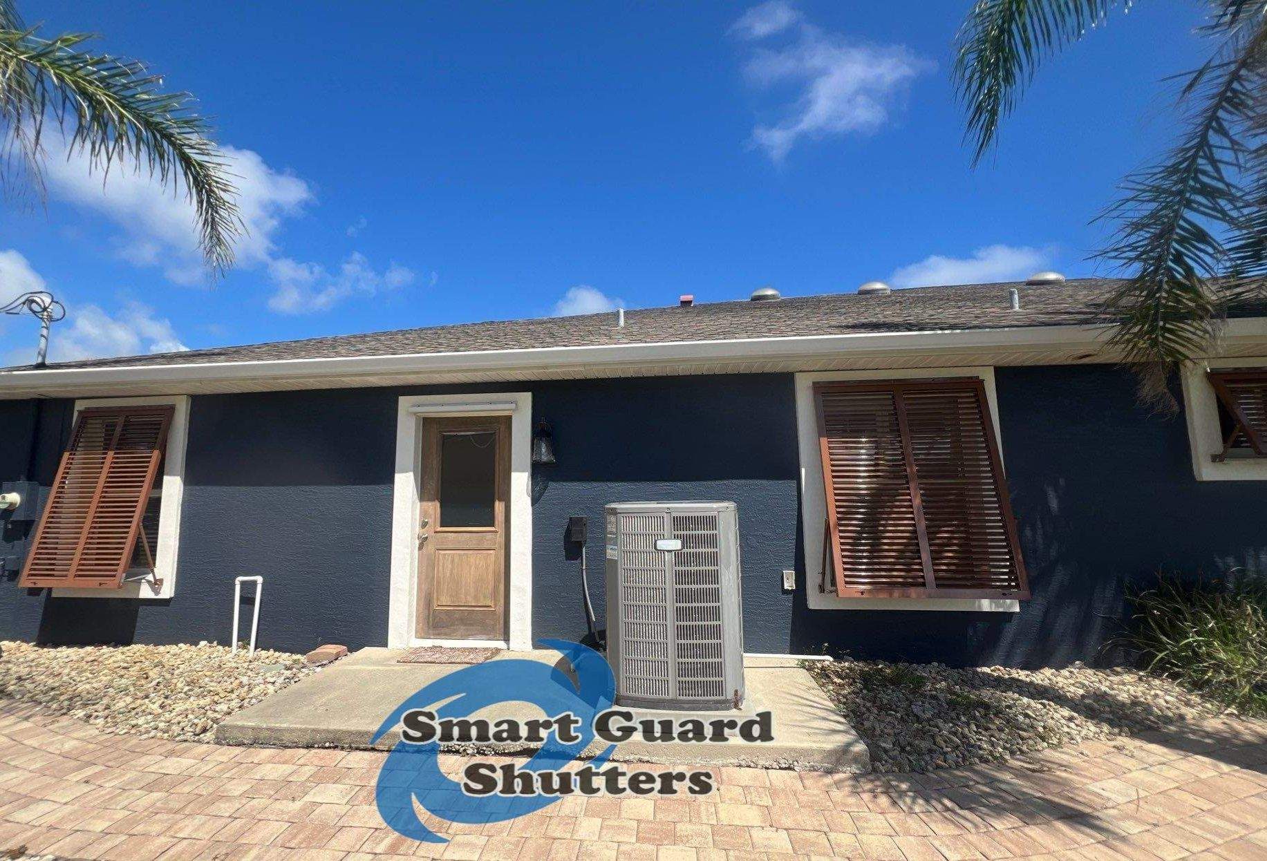 Impact Rated Bahama Shutters in Beige Brown by Smart Guard Shutters