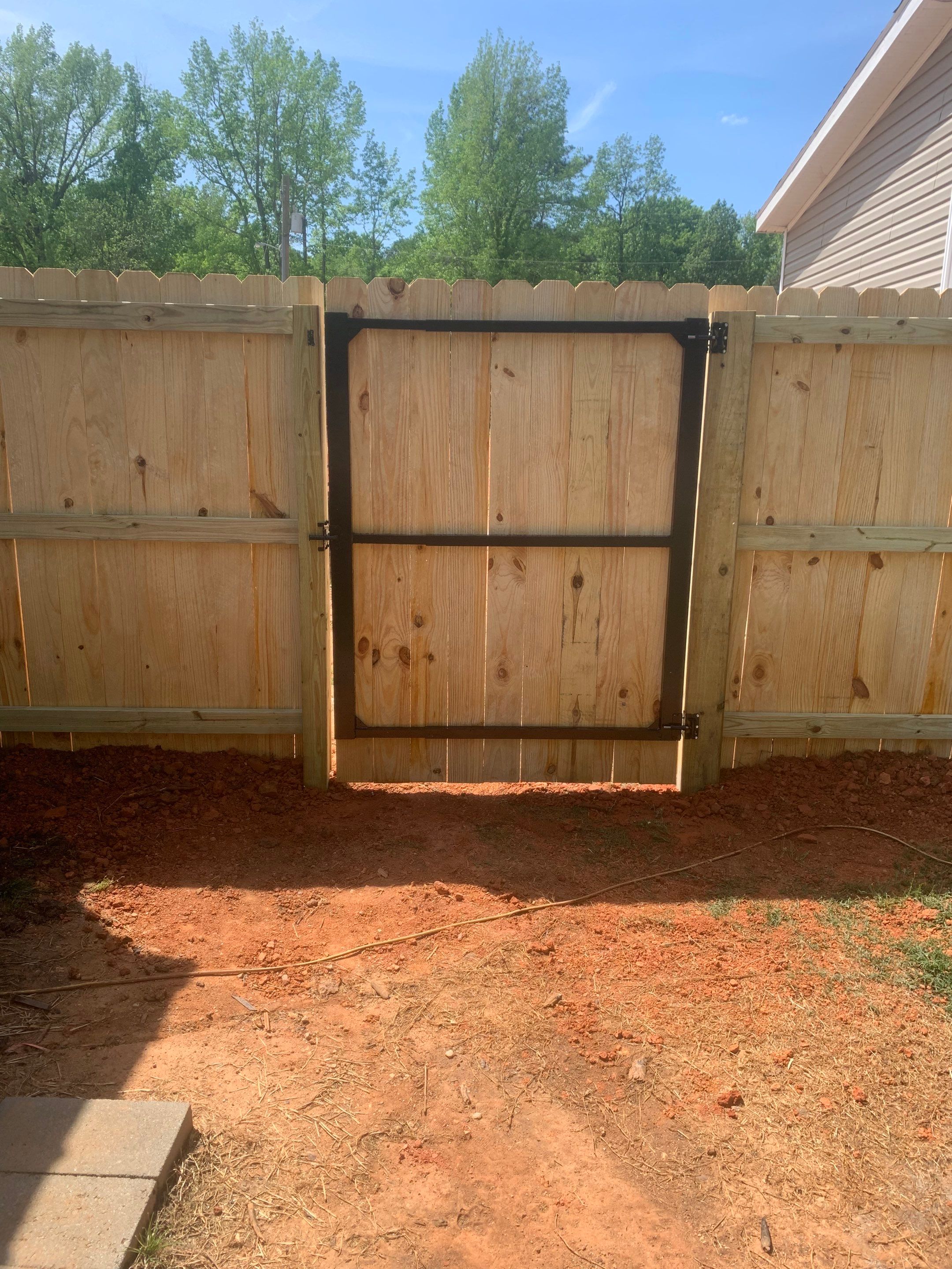 Stockade Wood Project in Roanoke Rapids by Superior Fence and Rail
