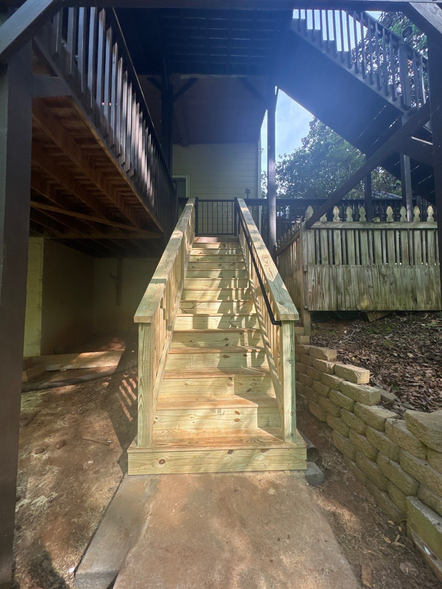 Exterior Deck and Stairway Staining Project in Canton by Swift Home Renovations 