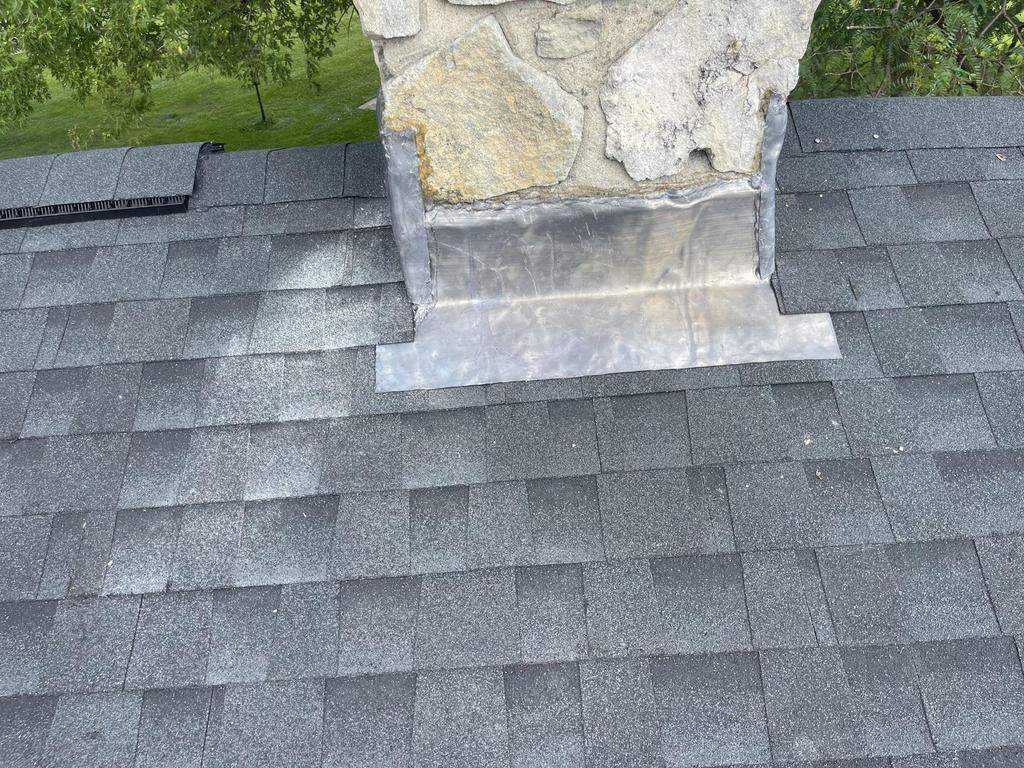 Storm damage roof replacement by Nitro Roofing and Construction