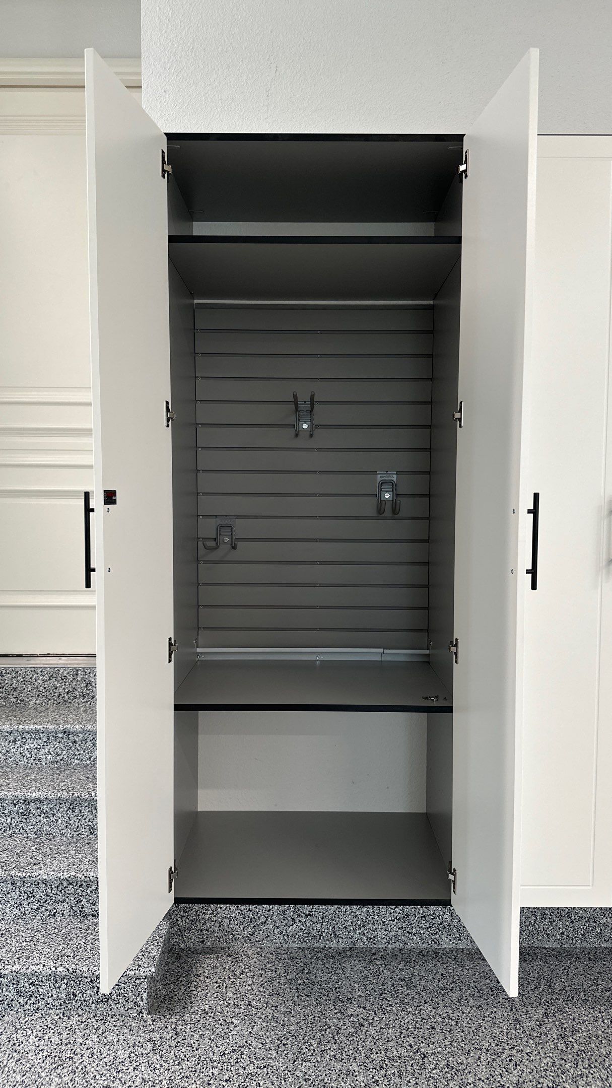 Mike & Pam transformed their garage with a Banner Garage Floor and Cabinets by Banner Garage