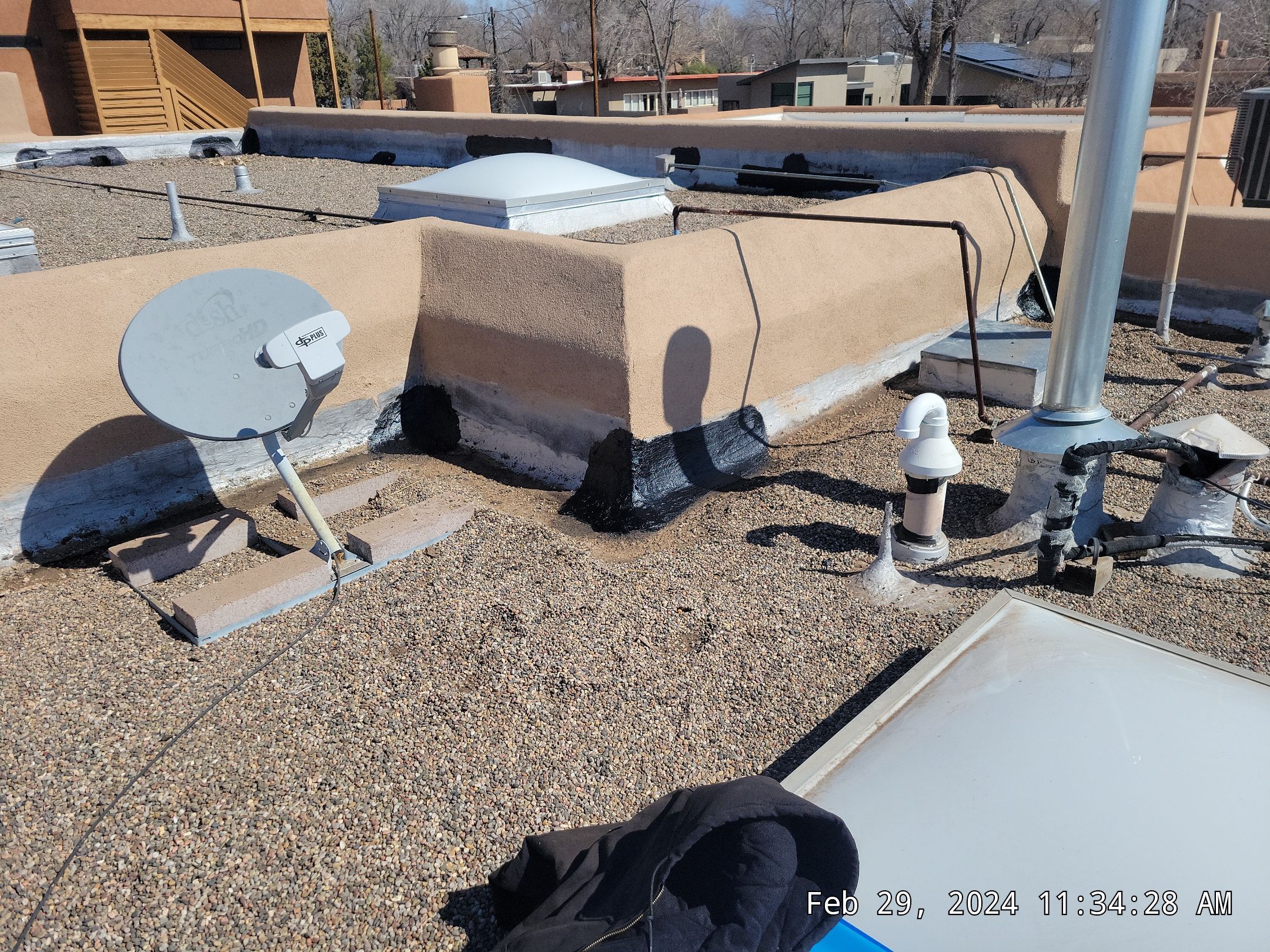Roof Maintenance and Low-E Tempered Glass Skylight Replacement on Gravel Roof in Northwest Albuquerque by Doyle Roof Masters Inc